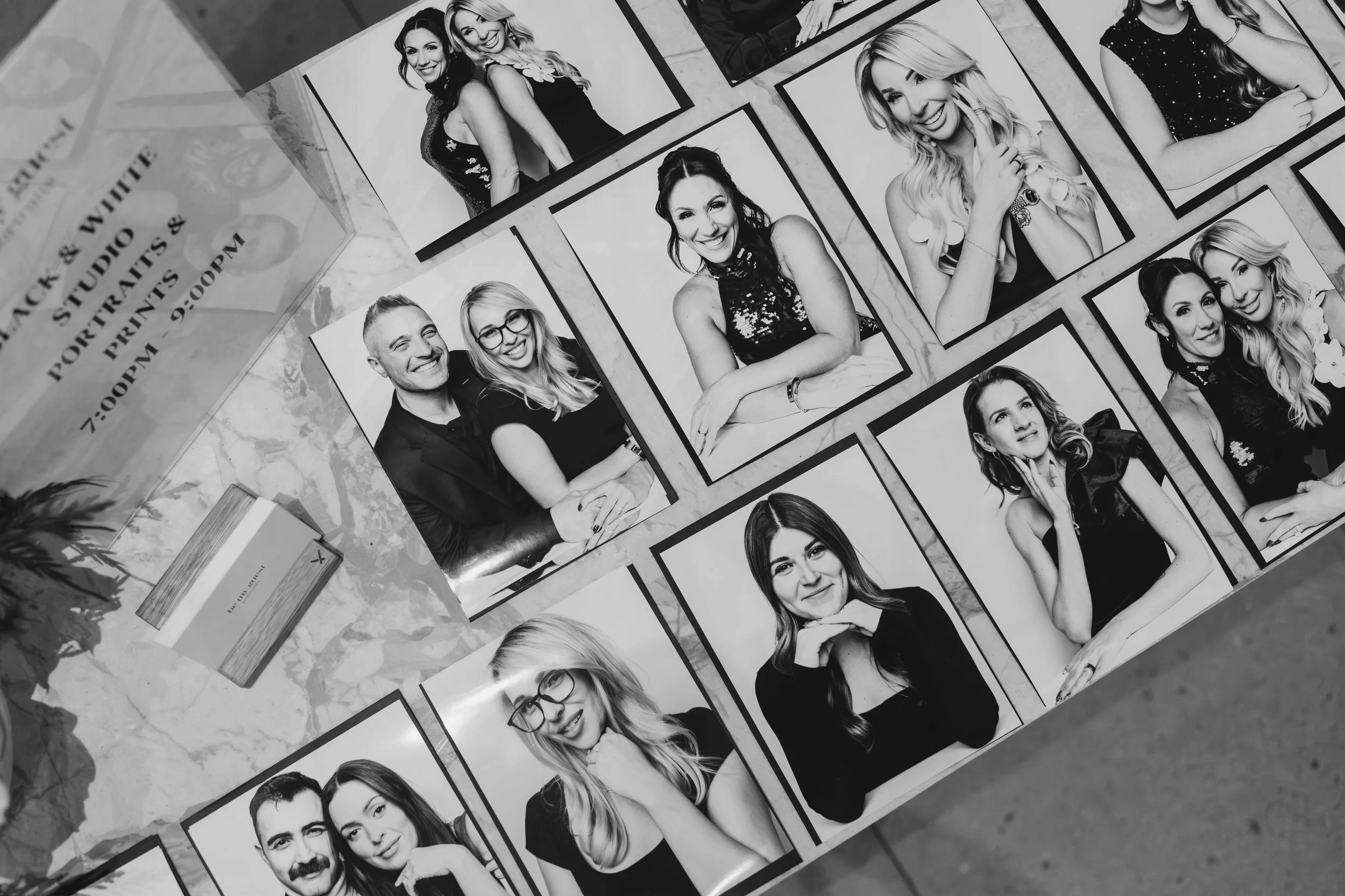 Spread of black and white prints by Be My Guest Portraits at a black tie gala.