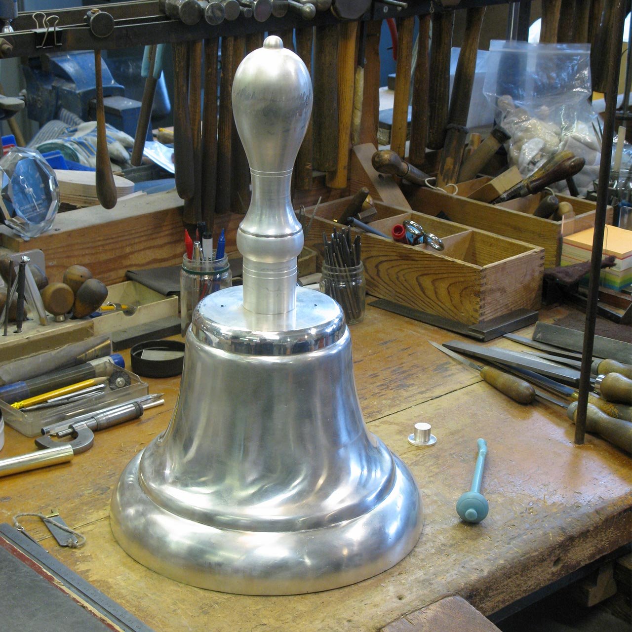 british-silverware-quipco-bell-on-bench.jpg