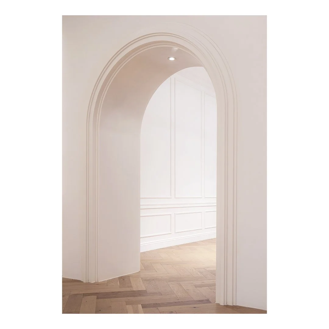 Parisa, Phnom Penh, 2024

The store features an open-plan layout with perimeter-hung displays, keeping the central space open and flexible. The fitting rooms, accessible through the archway shown in the image, provide customers with a more intimate e
