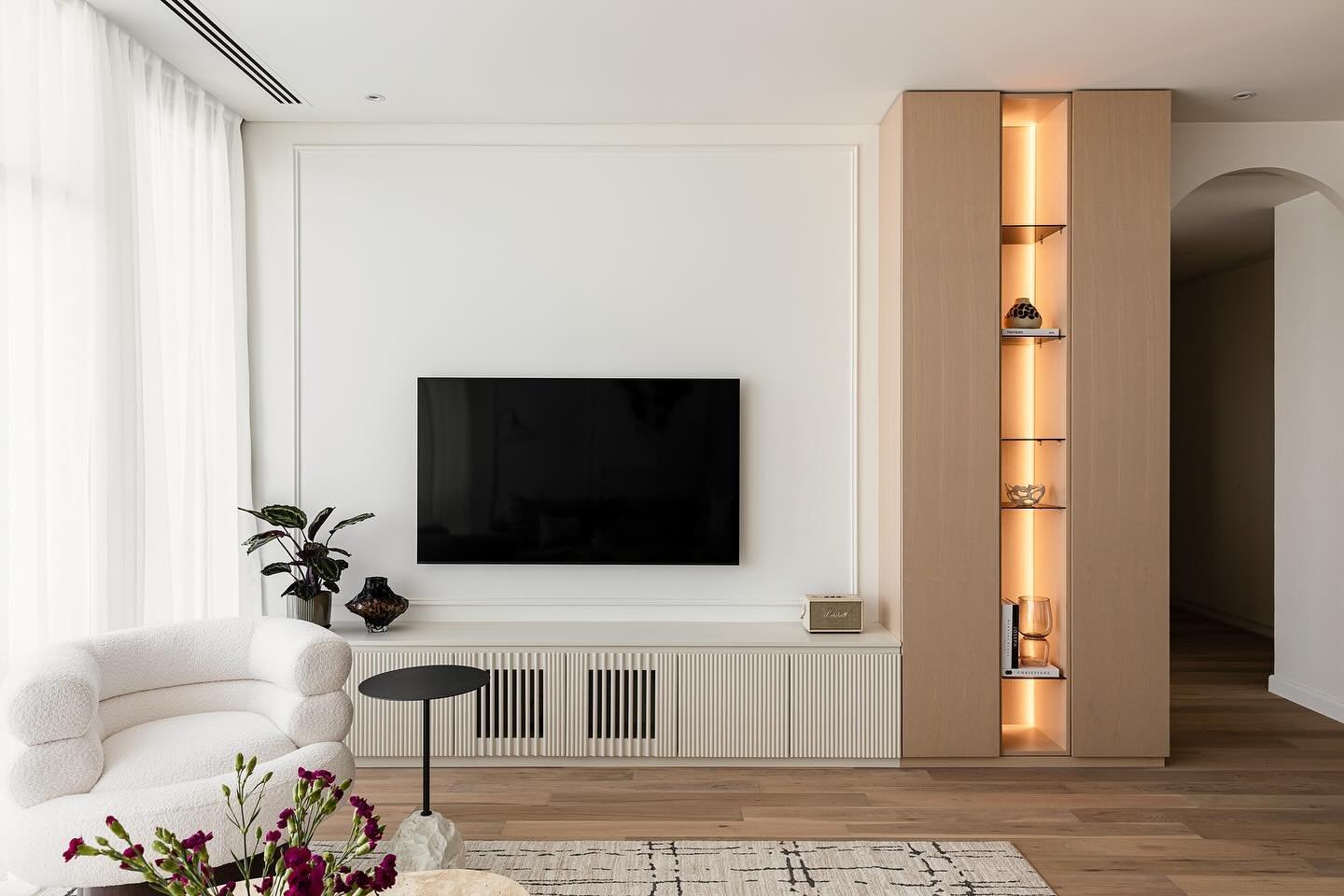 Experience the ultimate blend of style and functionality with our custom-designed TV unit. Featuring mood-enhancing LED lighting, sleek slatted doors for your receivers, and seamless hidden wiring. 

We love the perfect balance of functionality &amp;