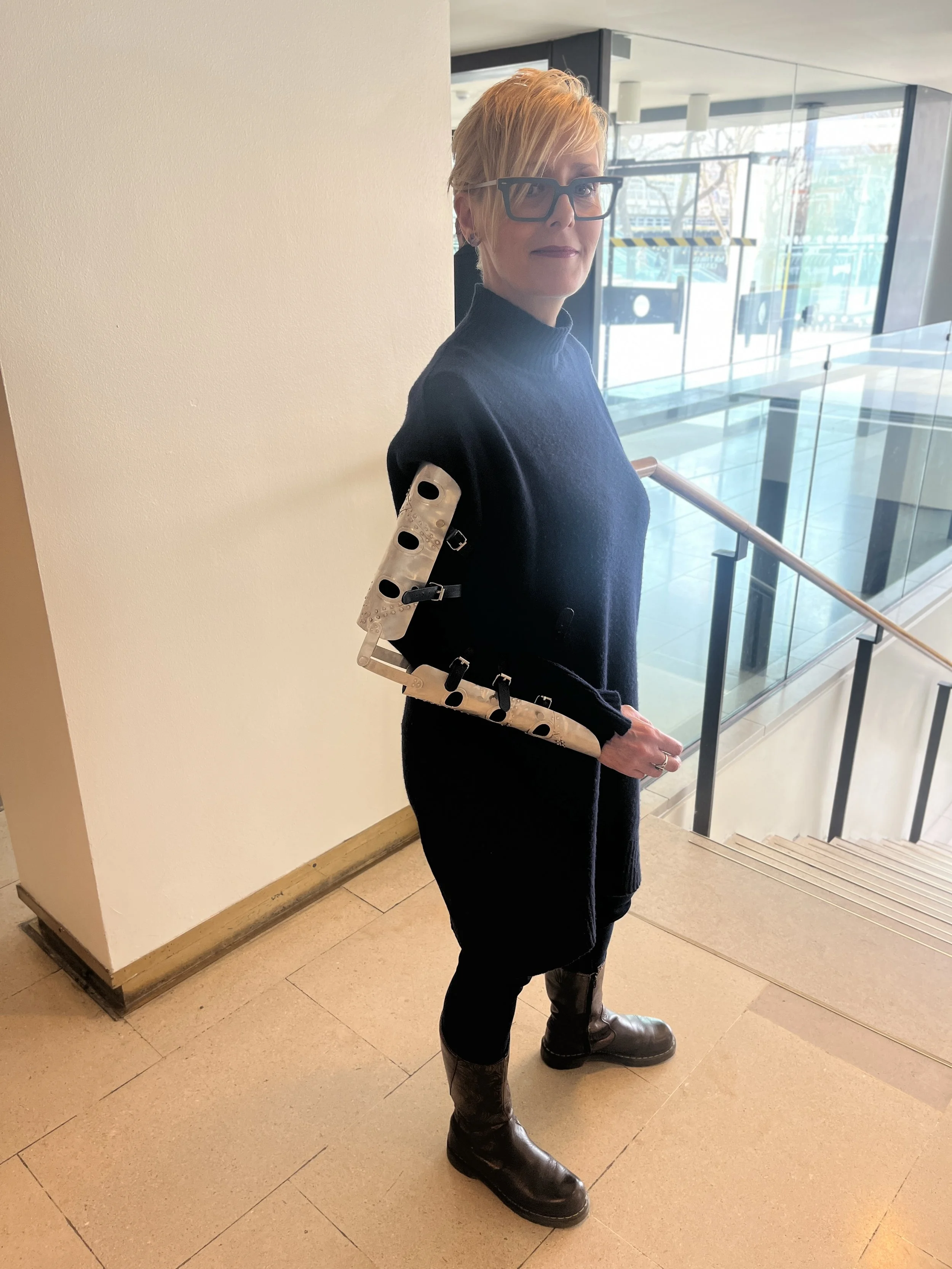 Charlotte modeling her new orthotic.jpg