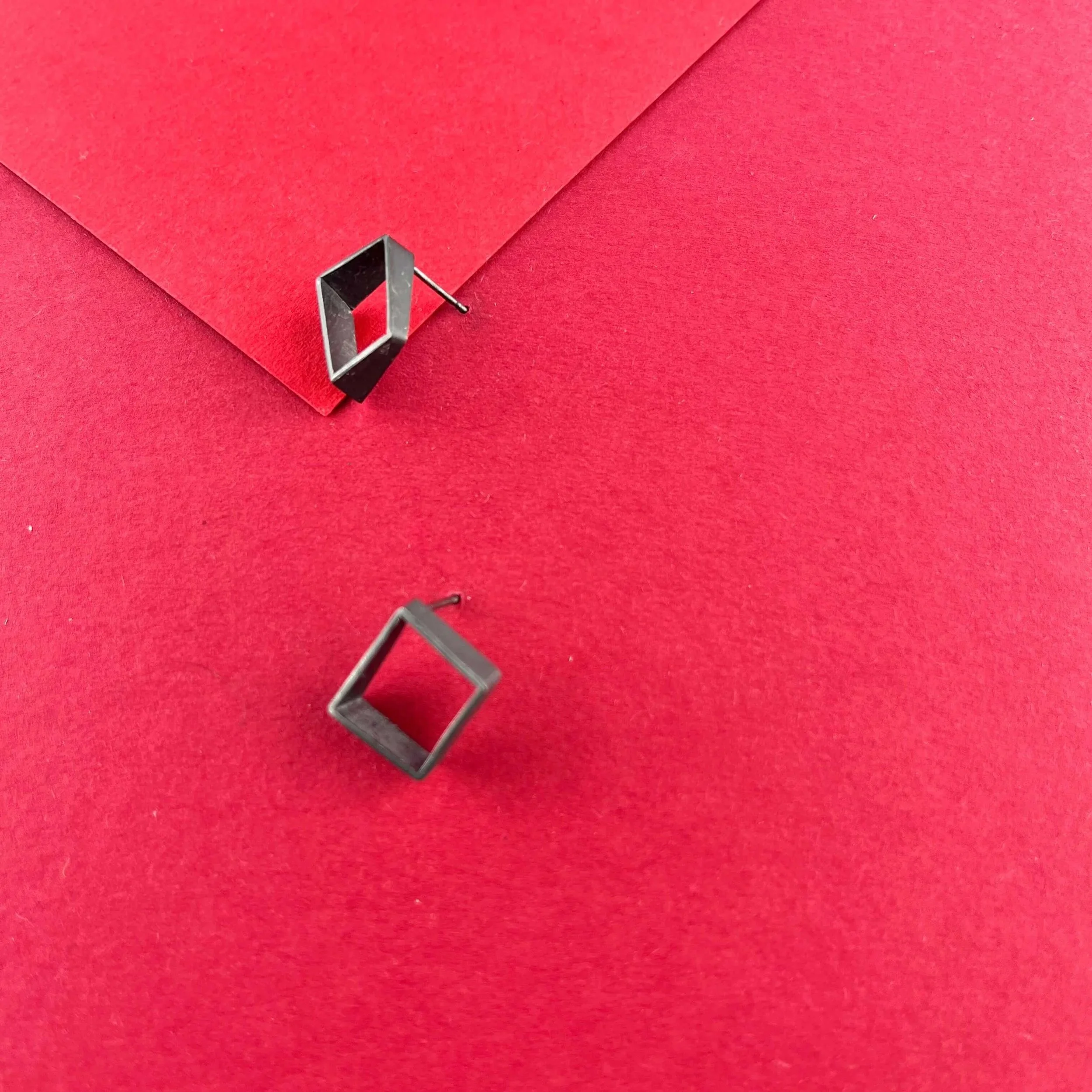 Mismatched oxidised silver studs