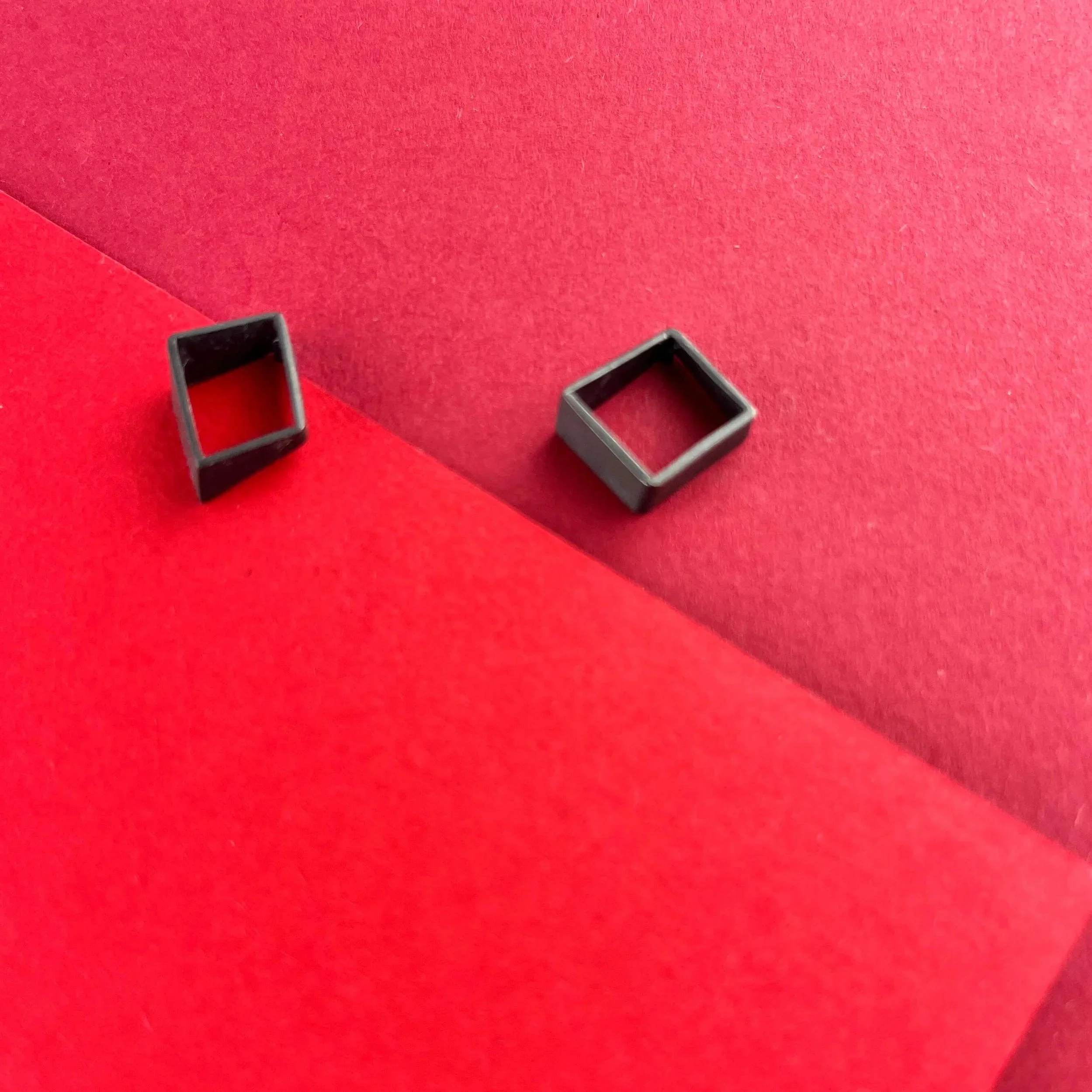 Oxidised mismatched stud earrings