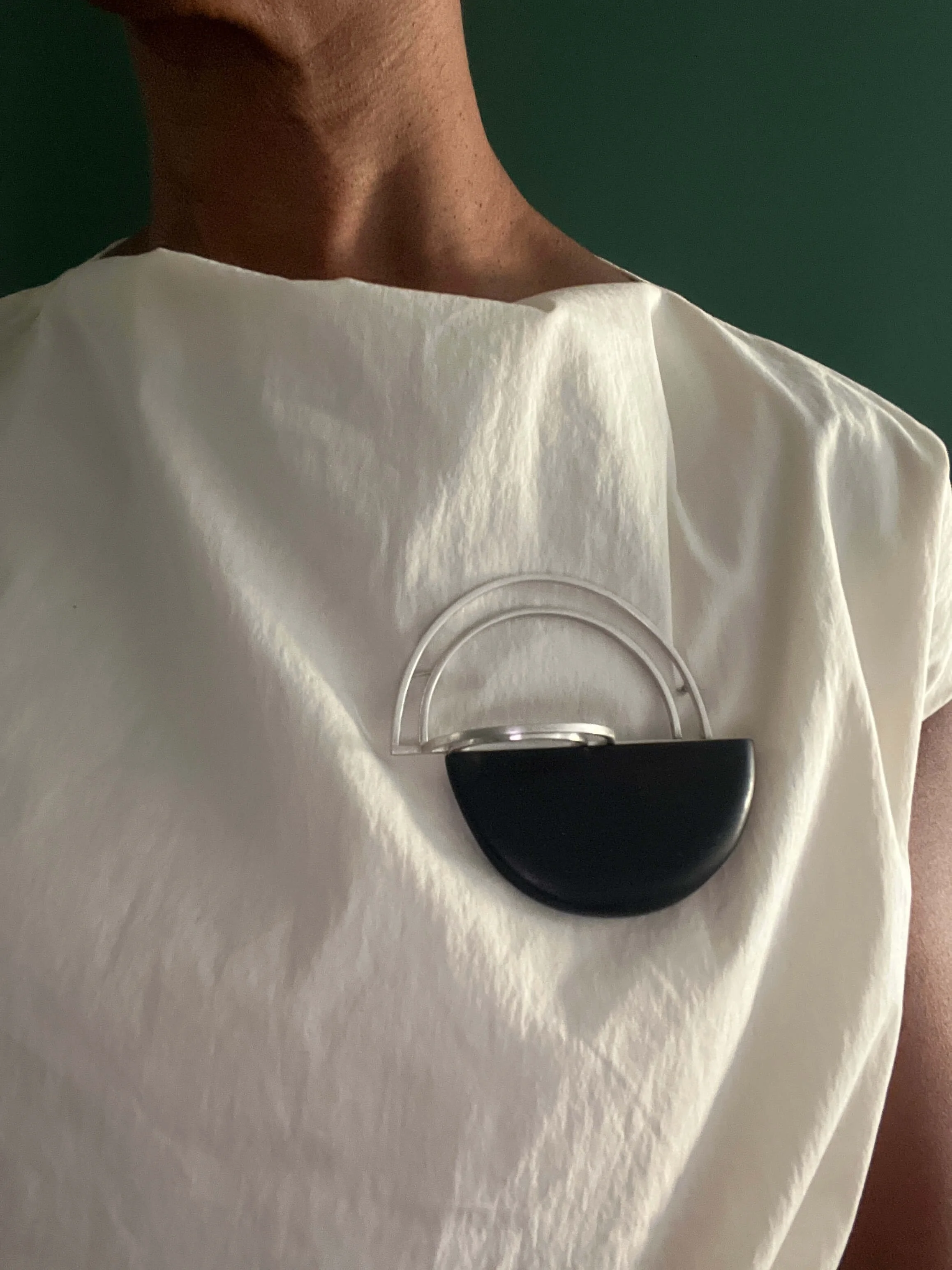 Sterling Silver and Ebony wood brooch on model