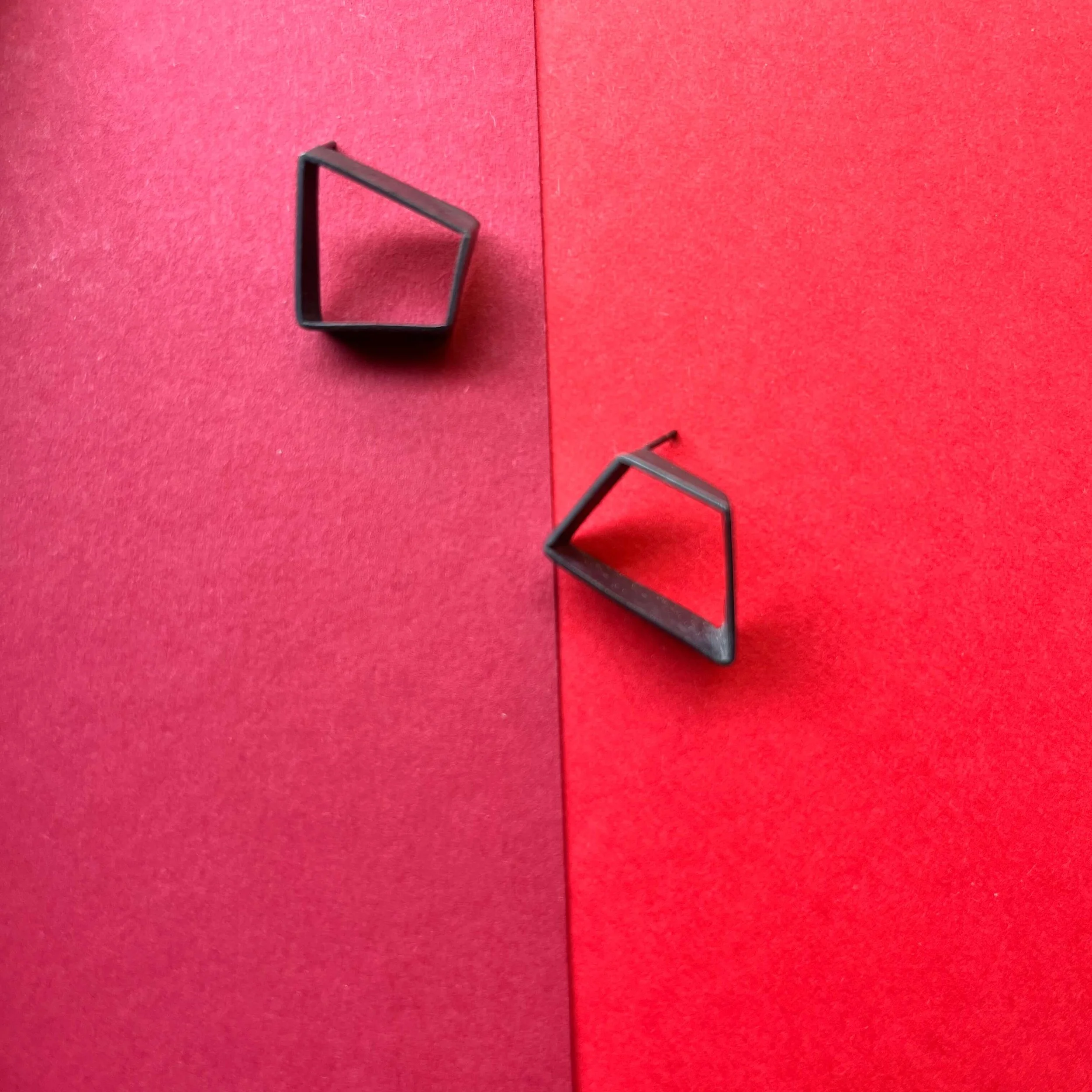Mismatched blackened silver earrings