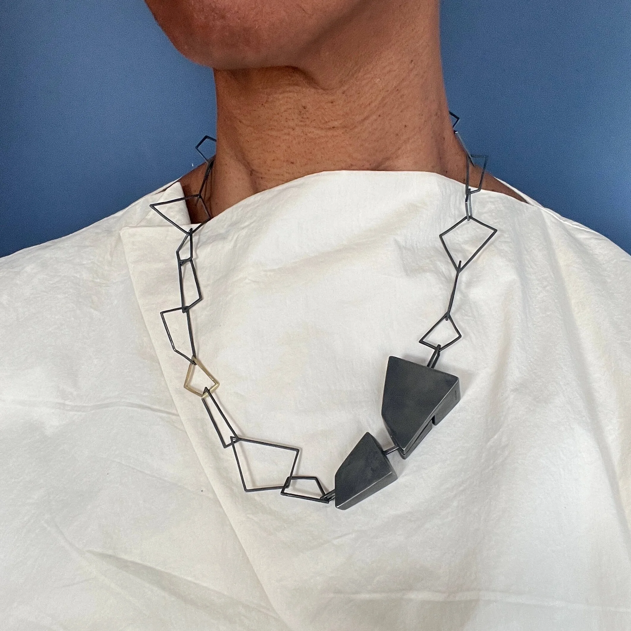 Geometric Oxidised Silver Necklace on model