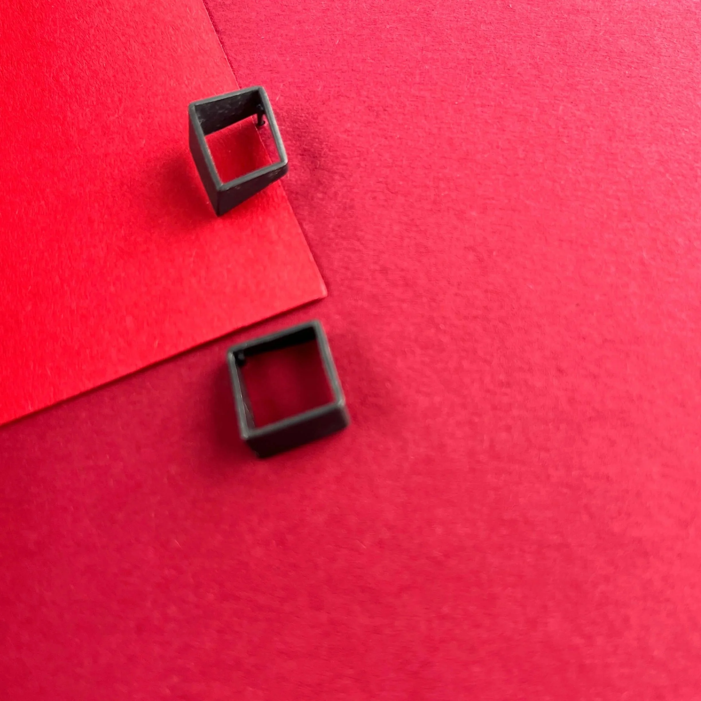 Asymmetric mismatched silver stud earrings