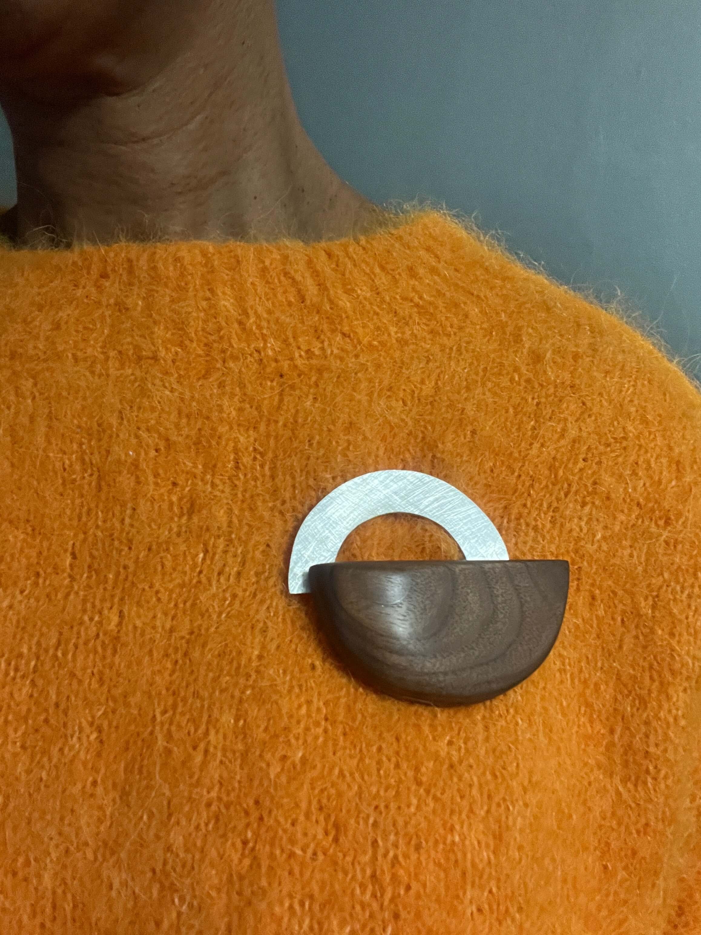 Barbican Walnut Brooch on model.JPG
