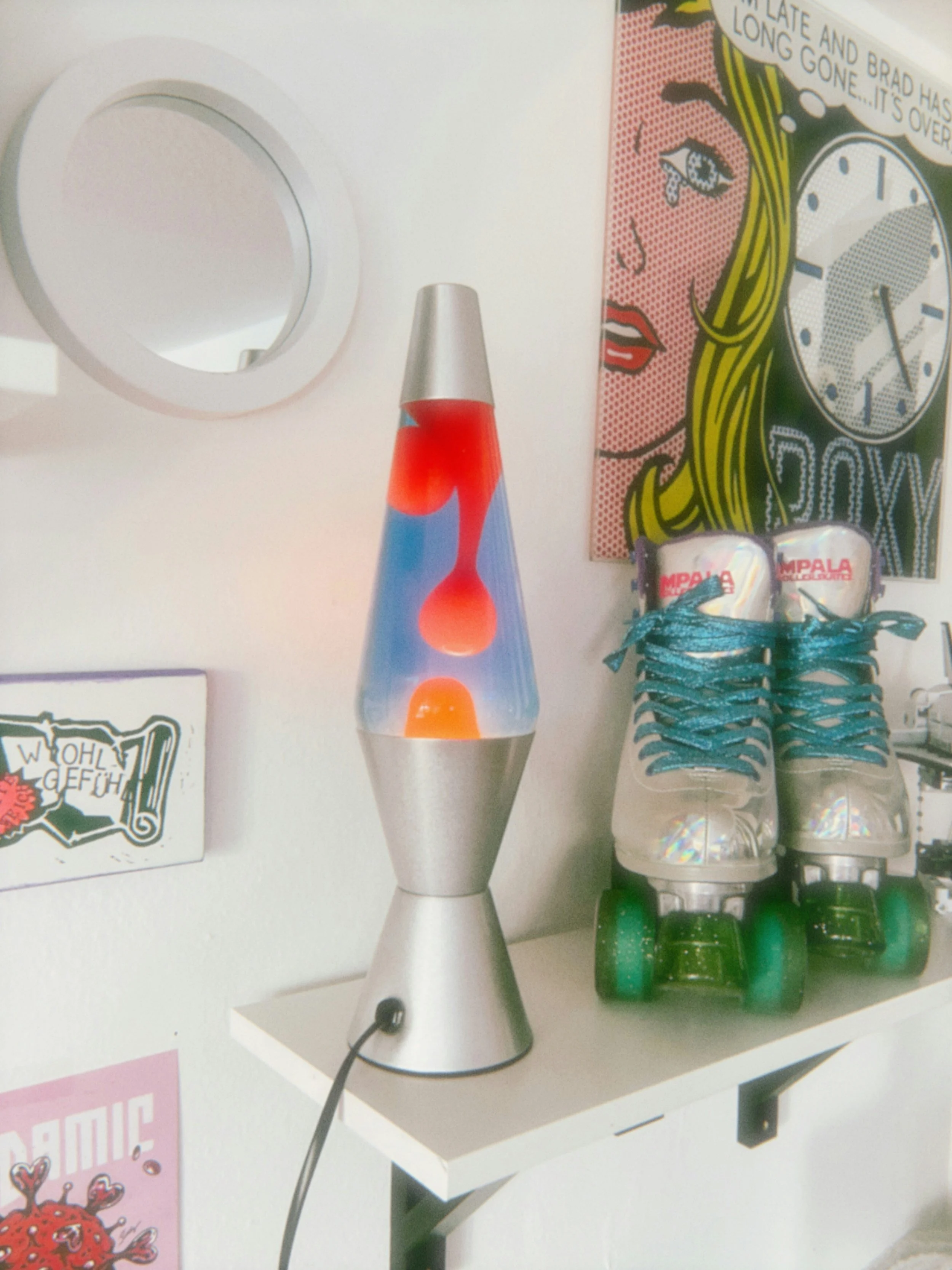 Red lava lamp in a childs room.