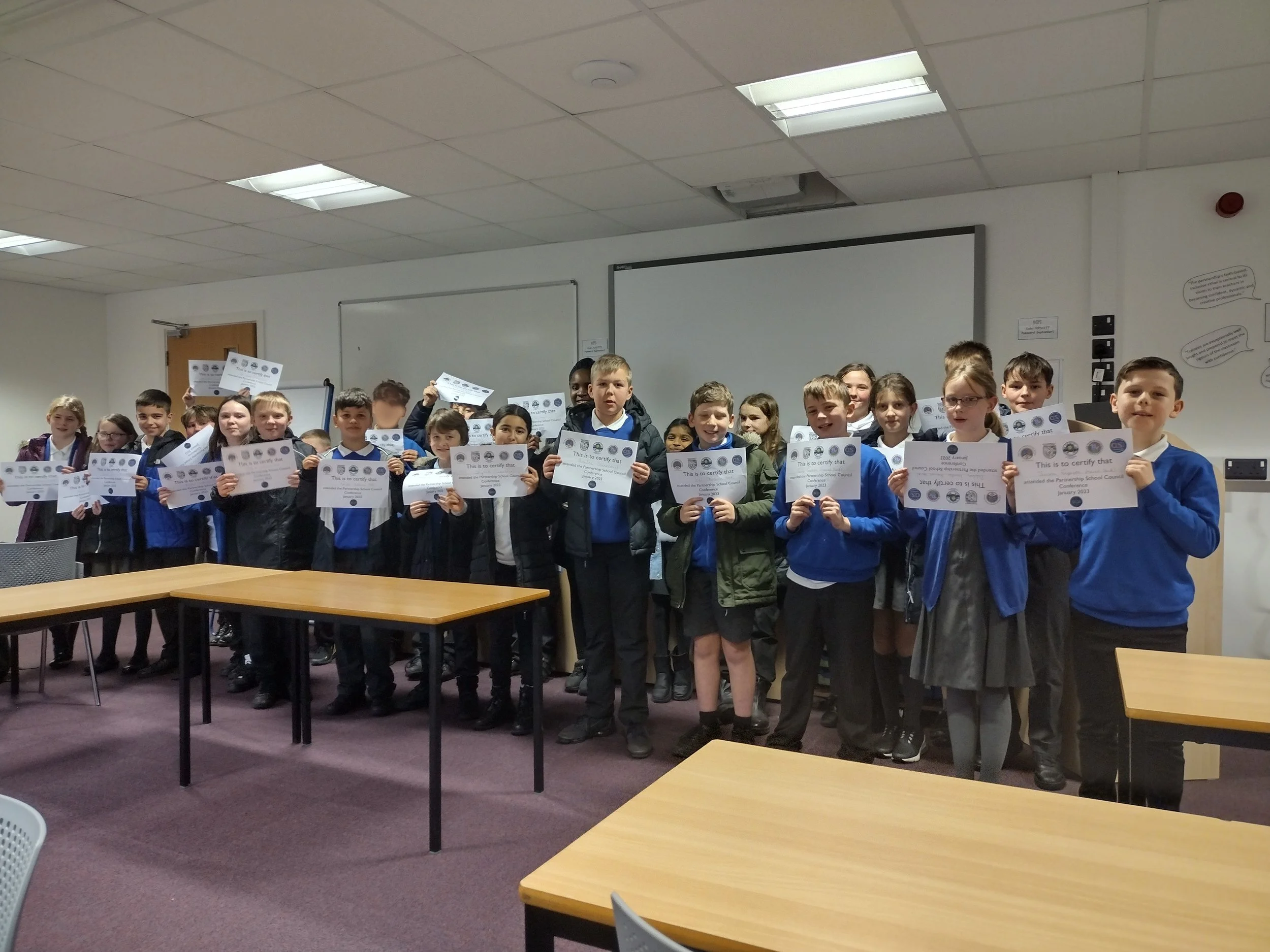 blur boy back furthest left by whiteboard - tall.jpg
