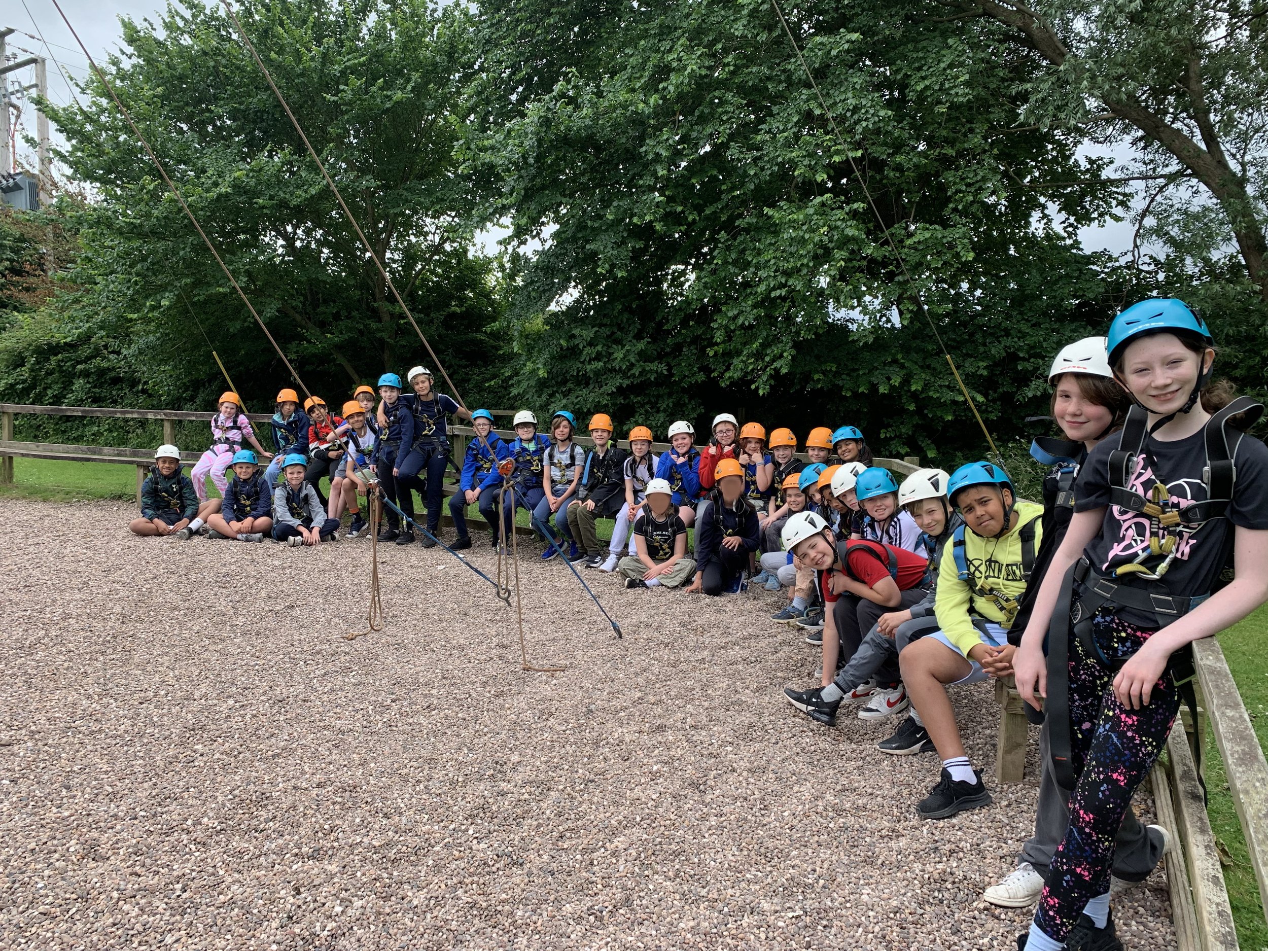 Need to but the face of the child all in black kneeling and the one crossed legged next to her.JPEG