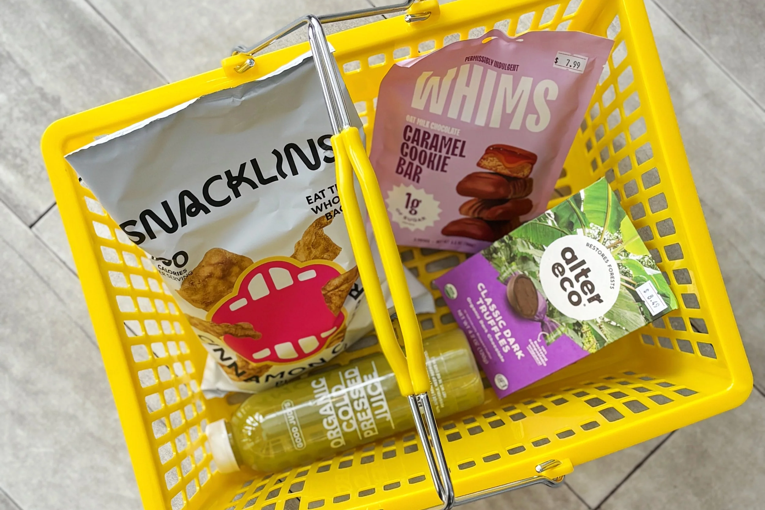 Healthy snacks in a yellow basket from Good Judys market