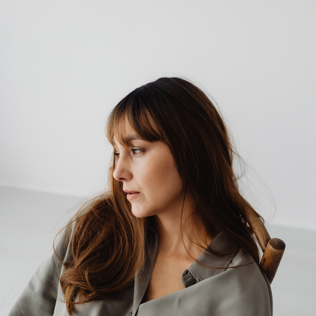 Stressed woman looking off into the distance.