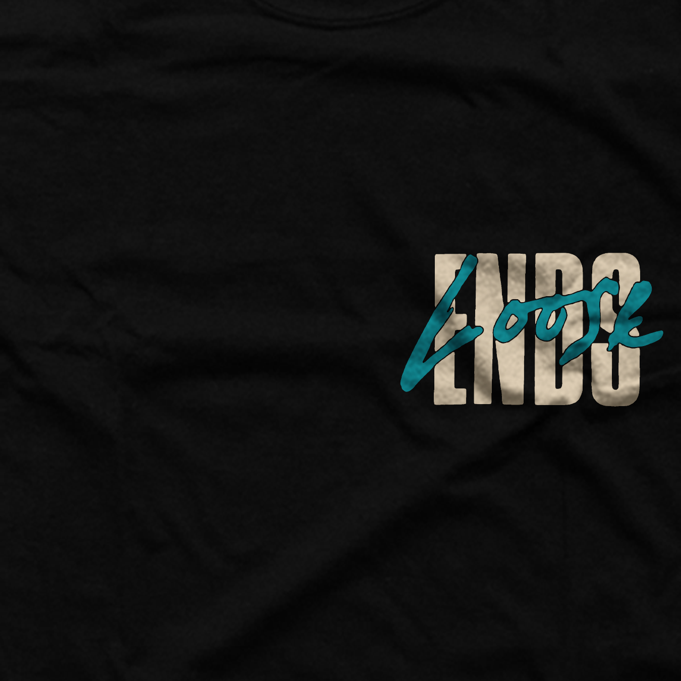 MOCK.UP.Loose.Ends.Front.Detail.Black.Teal.png