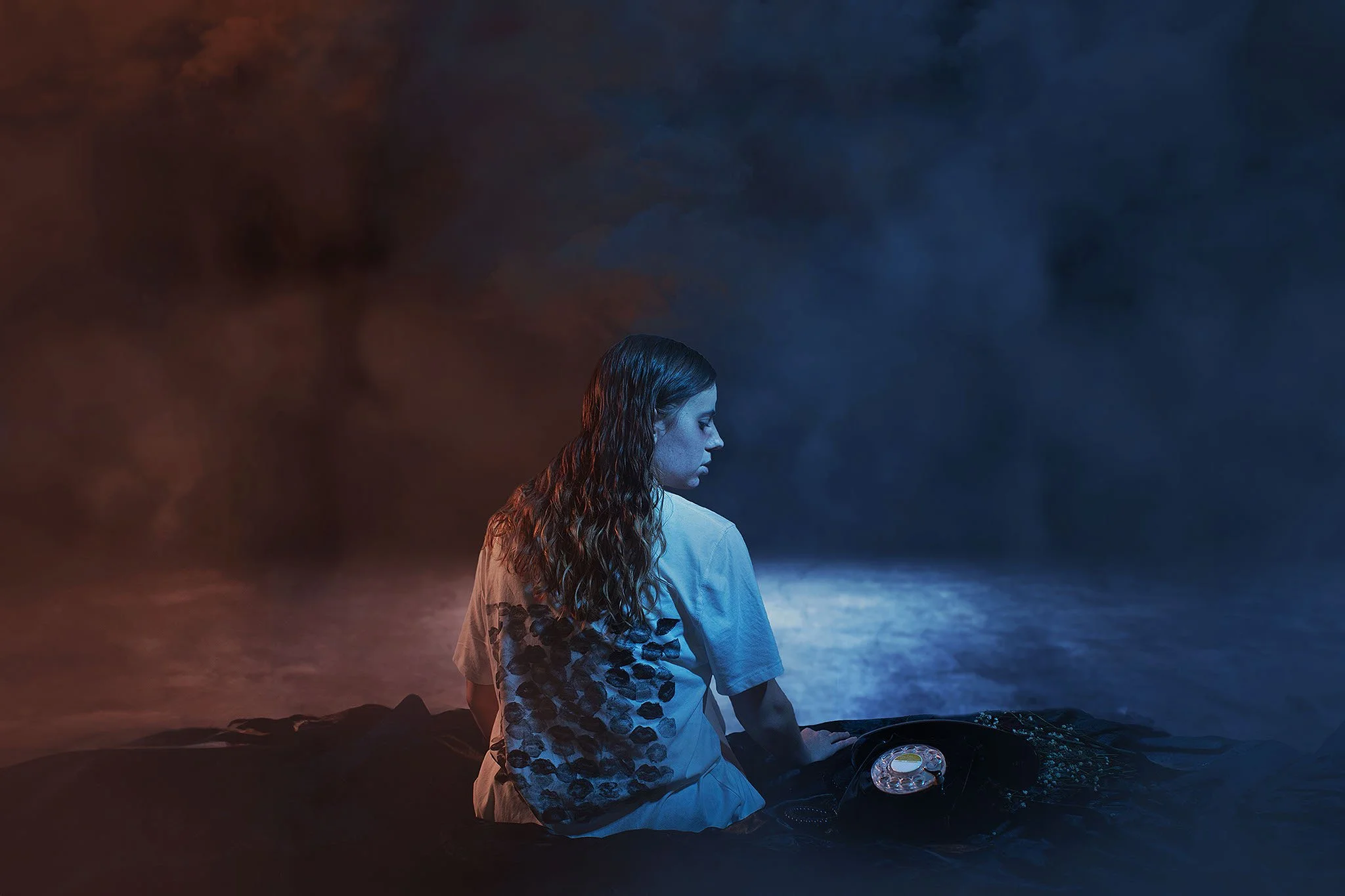 Conceptual portrait photography featuring cinematic storytelling and moody coastal imagery.