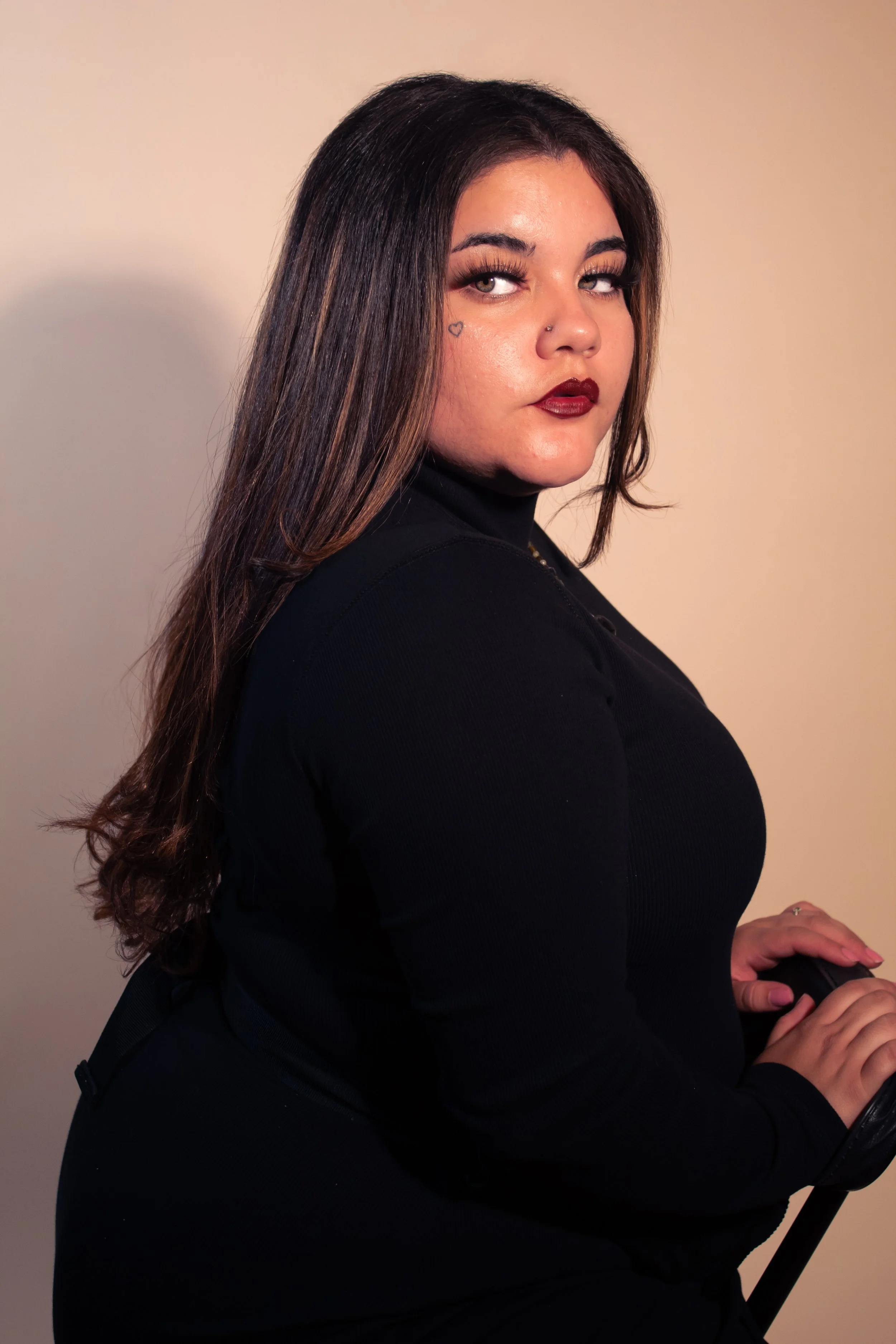 Professional portrait photography session featuring moody lighting and modern studio imagery in Port Saint Lucie, Florida.