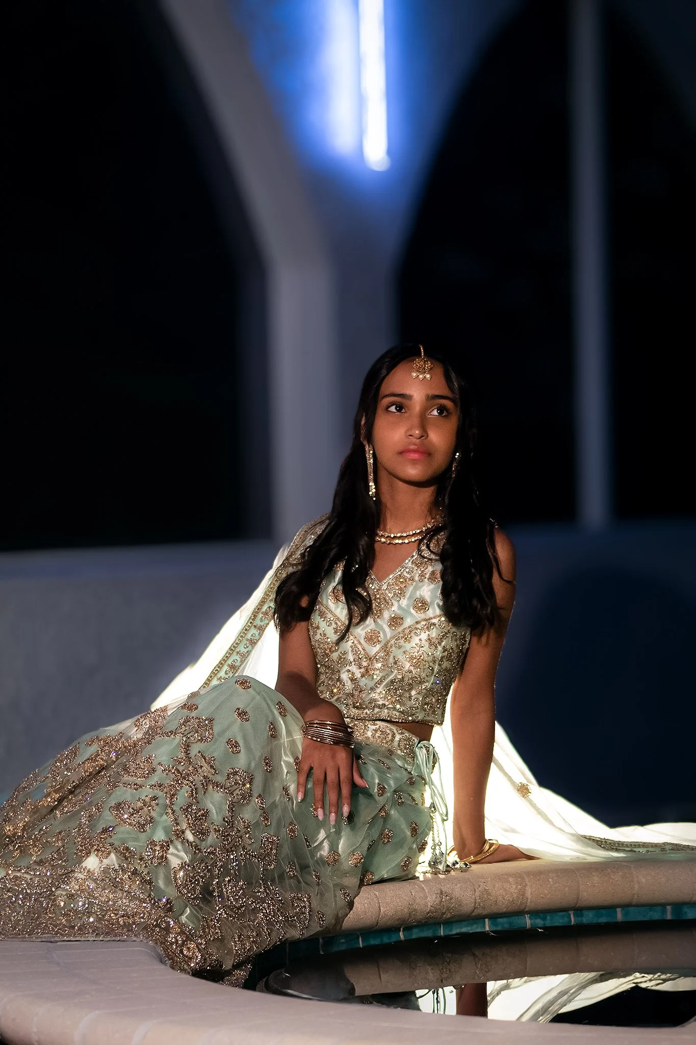 Cultural portrait photography featuring traditional Indian attire and elegant editorial styling.