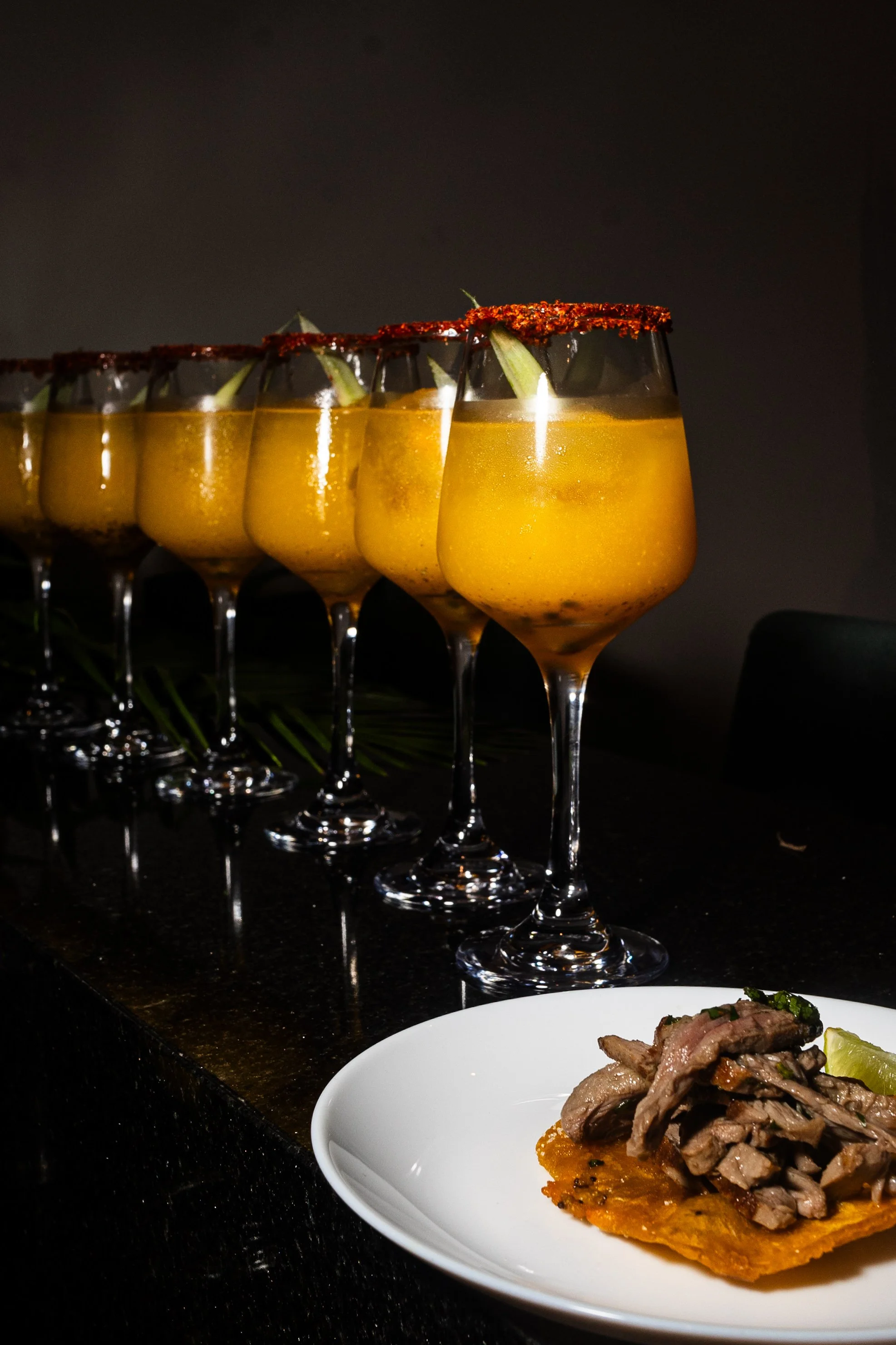 Private bartender service in Tulum with handcrafted cocktails during a private chef experience.