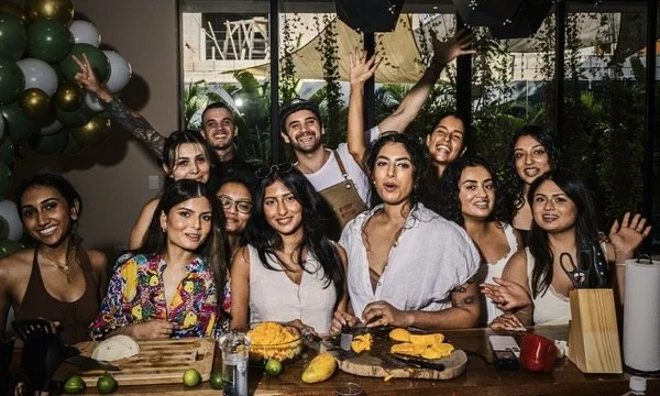 it is a cooking class with private chef Tulum, celebrating together in a villa with balloons, food and drinks.