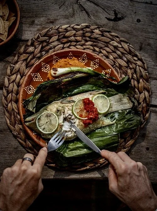 Patarashka, fish cooked with plantain leafs by a private chef in Tulum.