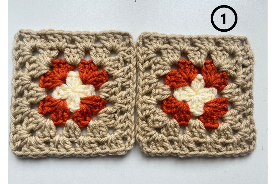 Two granny squares aligned side by side, ready to join.