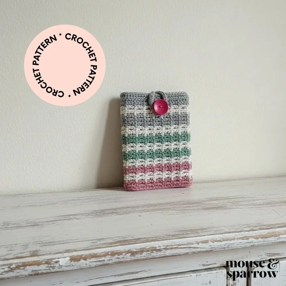 Handmade crochet tablet cover with button loop, easy beginner-friendly pattern, practical and modern crochet project.
