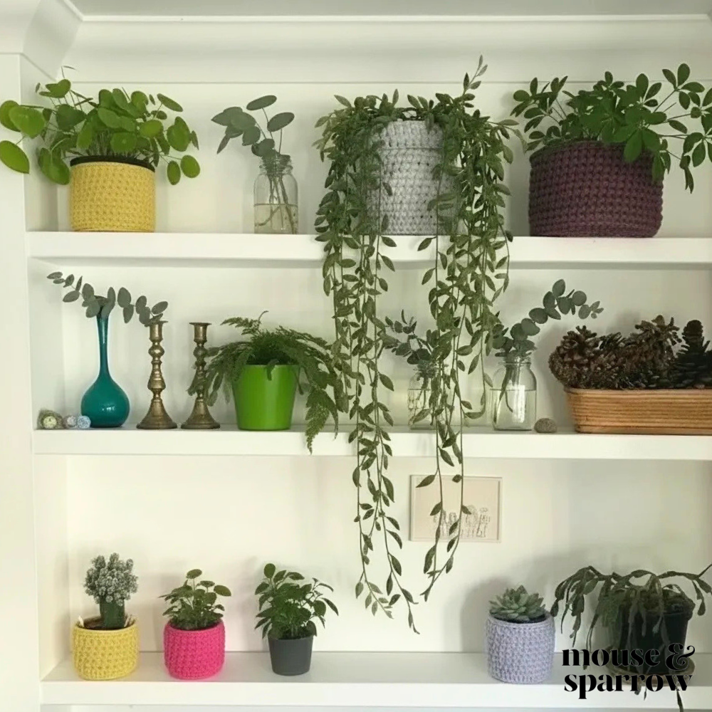 crochet plant pot covers on a shelf