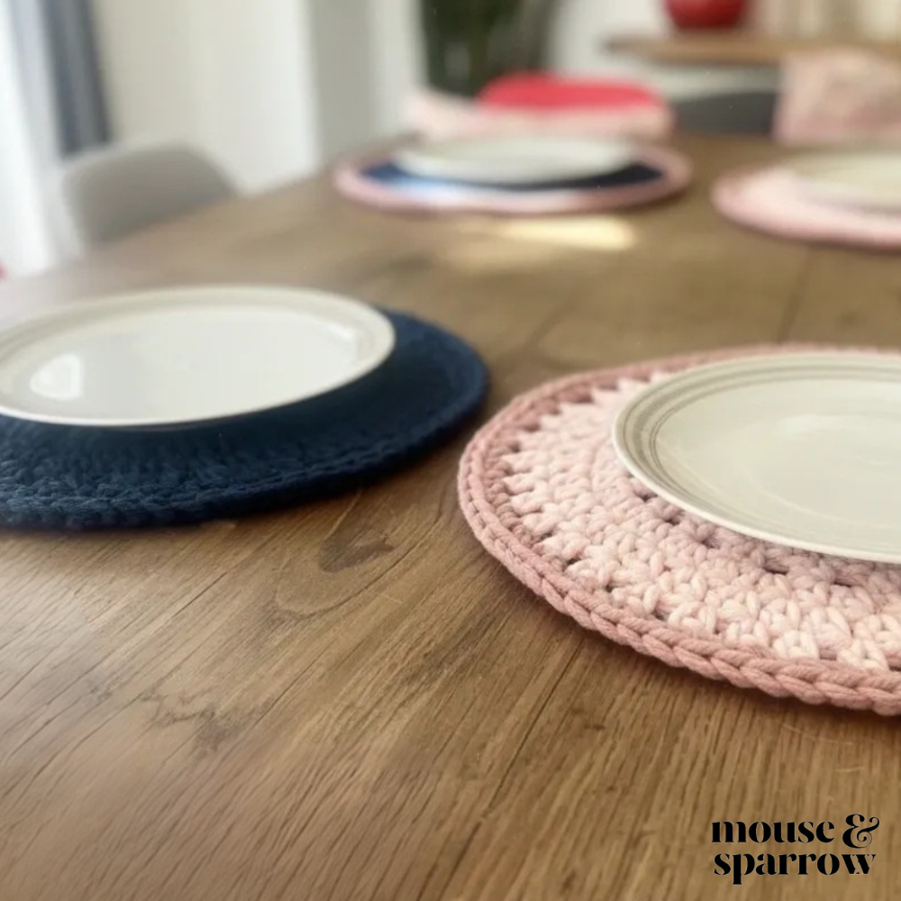 round crochet placemats on a dining table