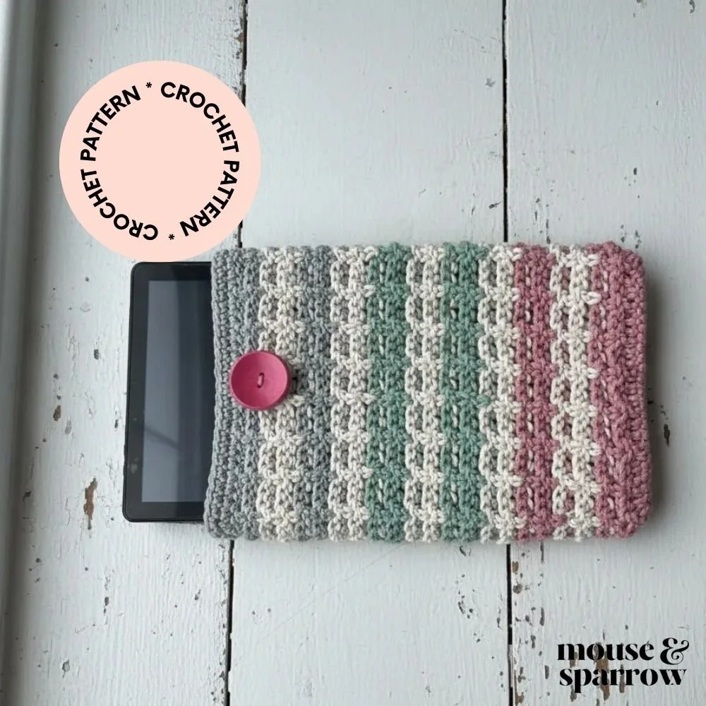 Beginner crochet tablet sleeve with front post stitch texture, modern handmade iPad cover using cotton yarn.