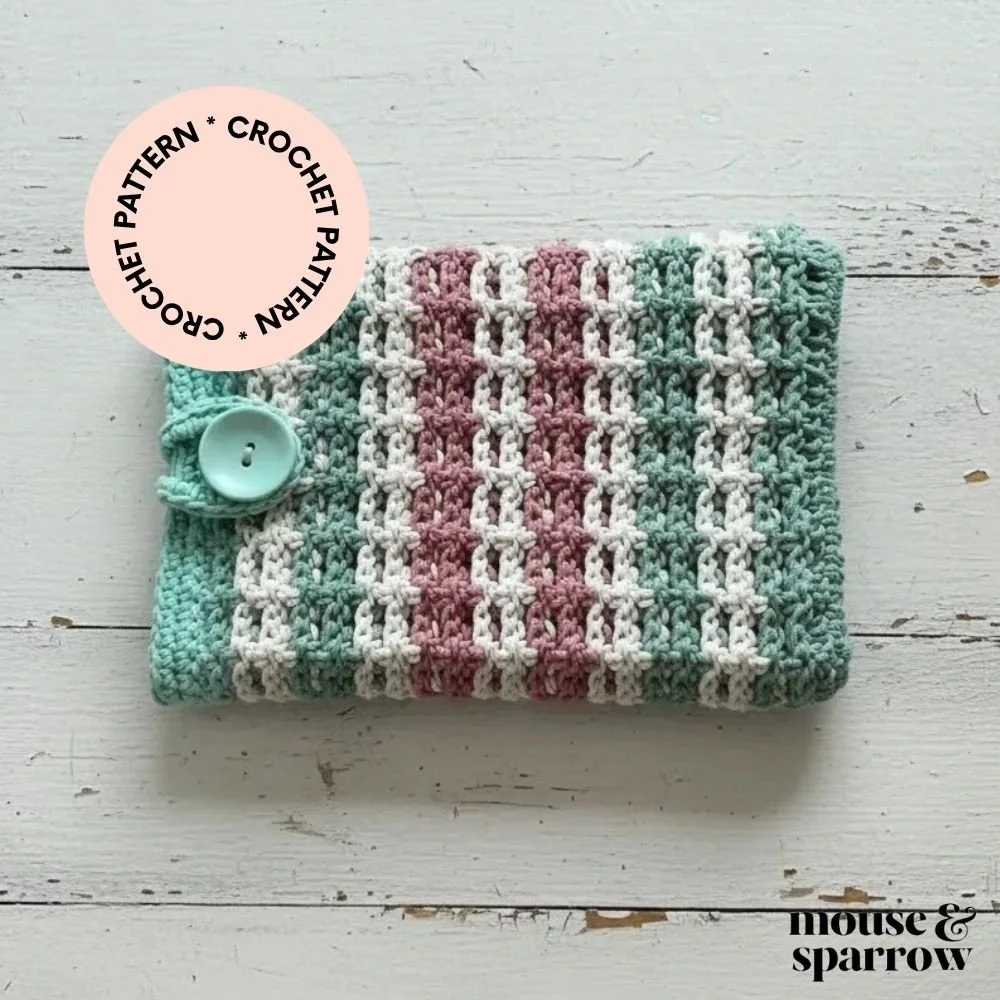 Modern crochet tablet case with button closure, beginner crochet pattern using cotton yarn, easy DIY device sleeve.