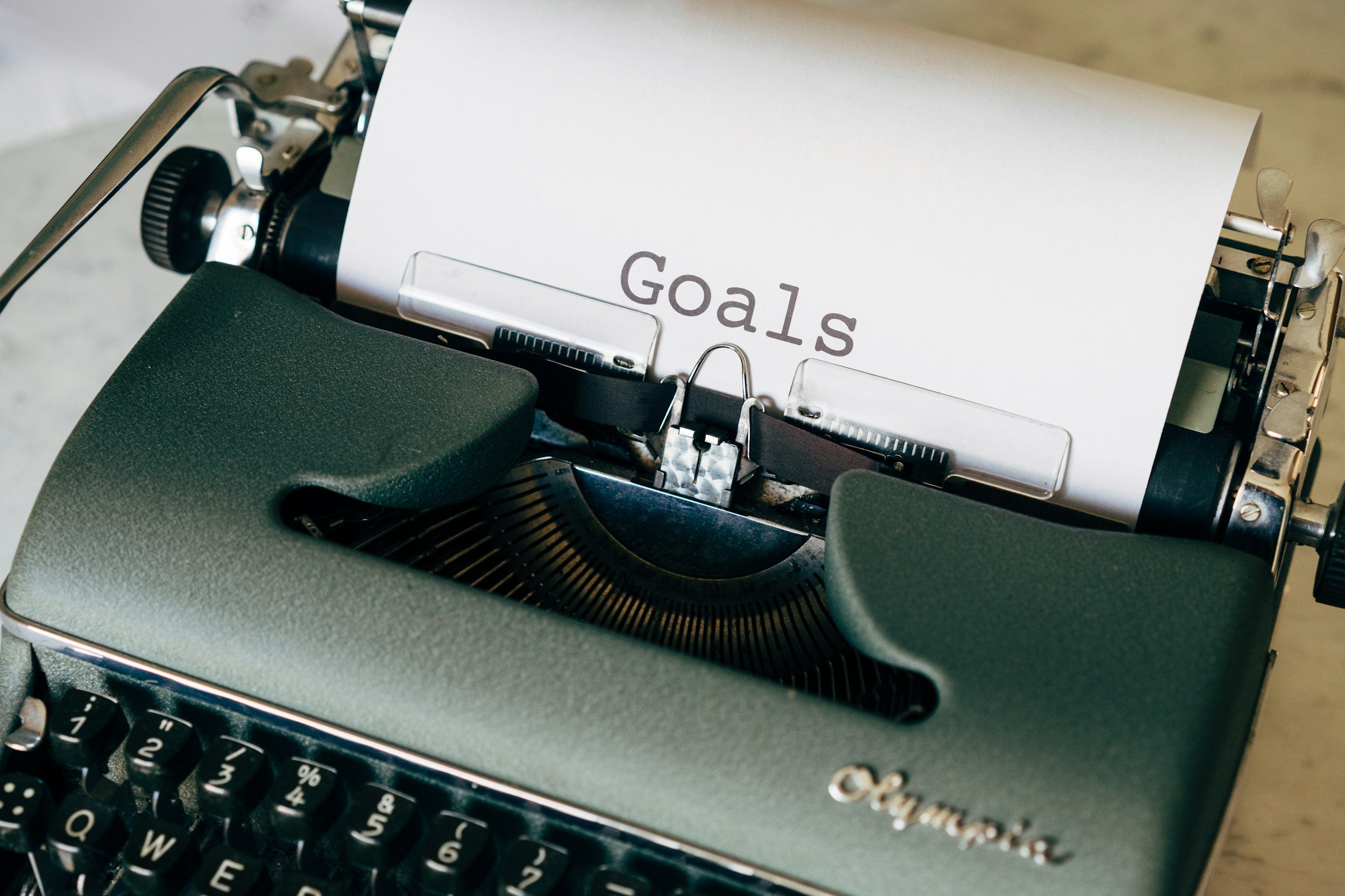 Typewriter with "goals" written on it