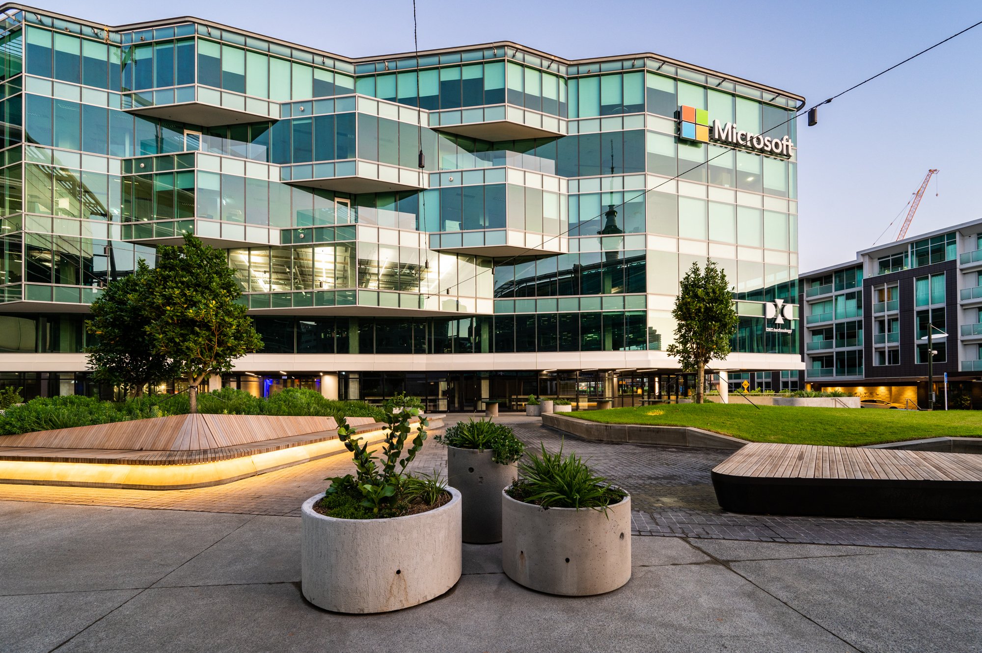 Microsoft building with glass facade and landscaped outdoor area
