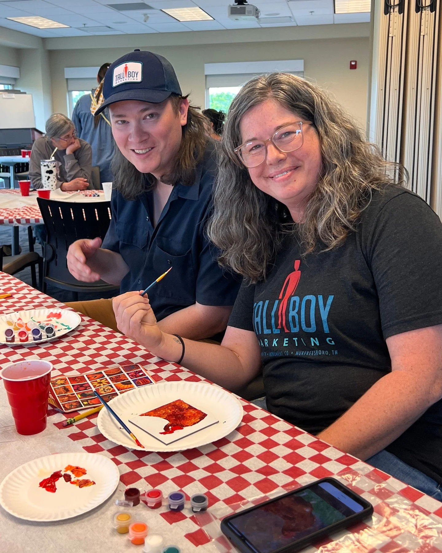 Joey and Kiera broke away from their computers today to get creative for something entirely different &mdash; the America 250 Mural Mosaic &ldquo;Painting Day&rdquo; Chamber Event. Creating a work of art each that will be combined with others from si