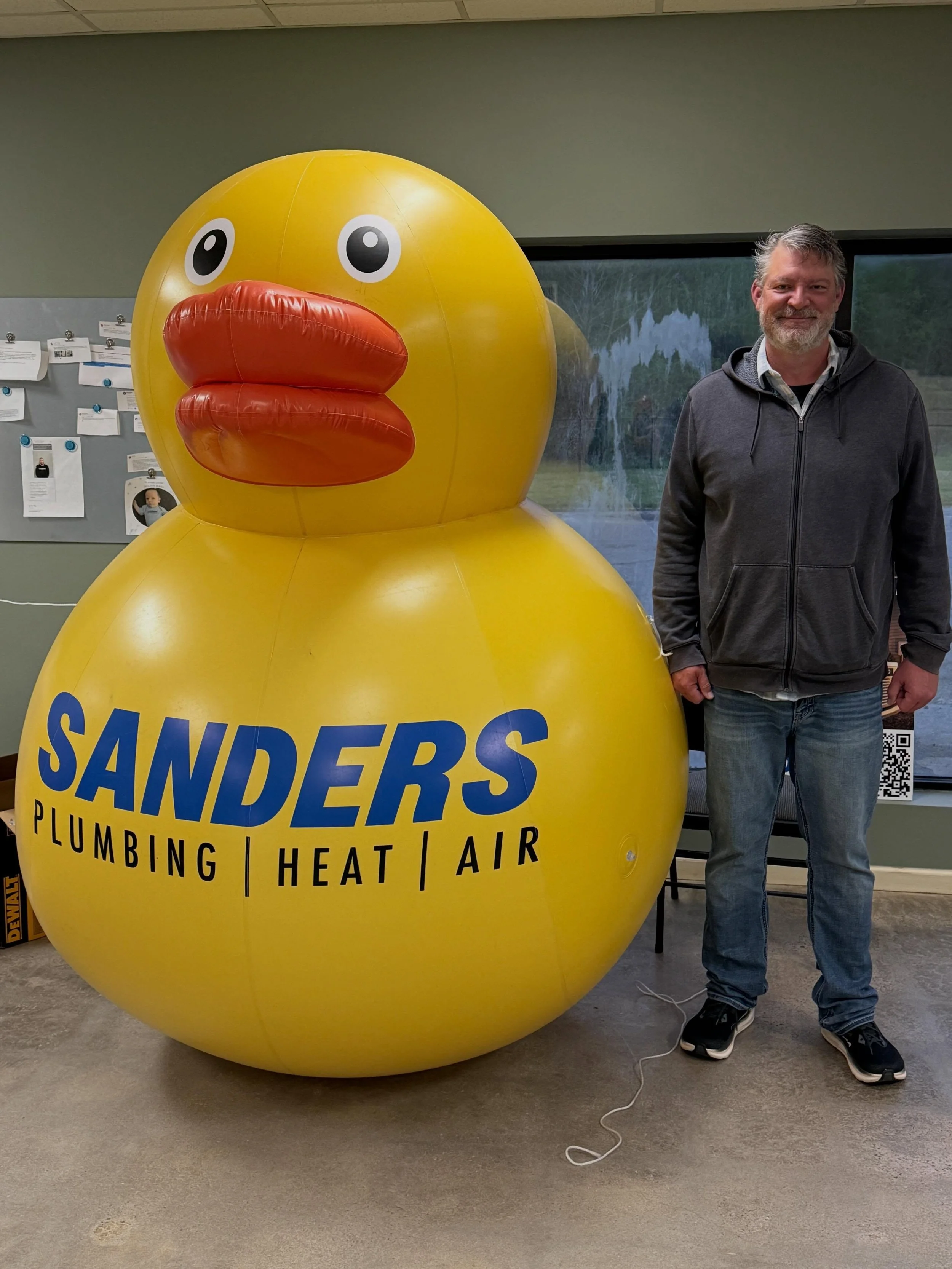 Every now and then we find things taller than Justin and Joey (6&rsquo;8&rdquo;) Here&rsquo;s Justin with &ldquo;Can Do&rdquo; the Duck while visiting our friends at Sanders Plumbing HVAC in Little Rock. #flashbackfriday #tallboymarketing #sandersplu