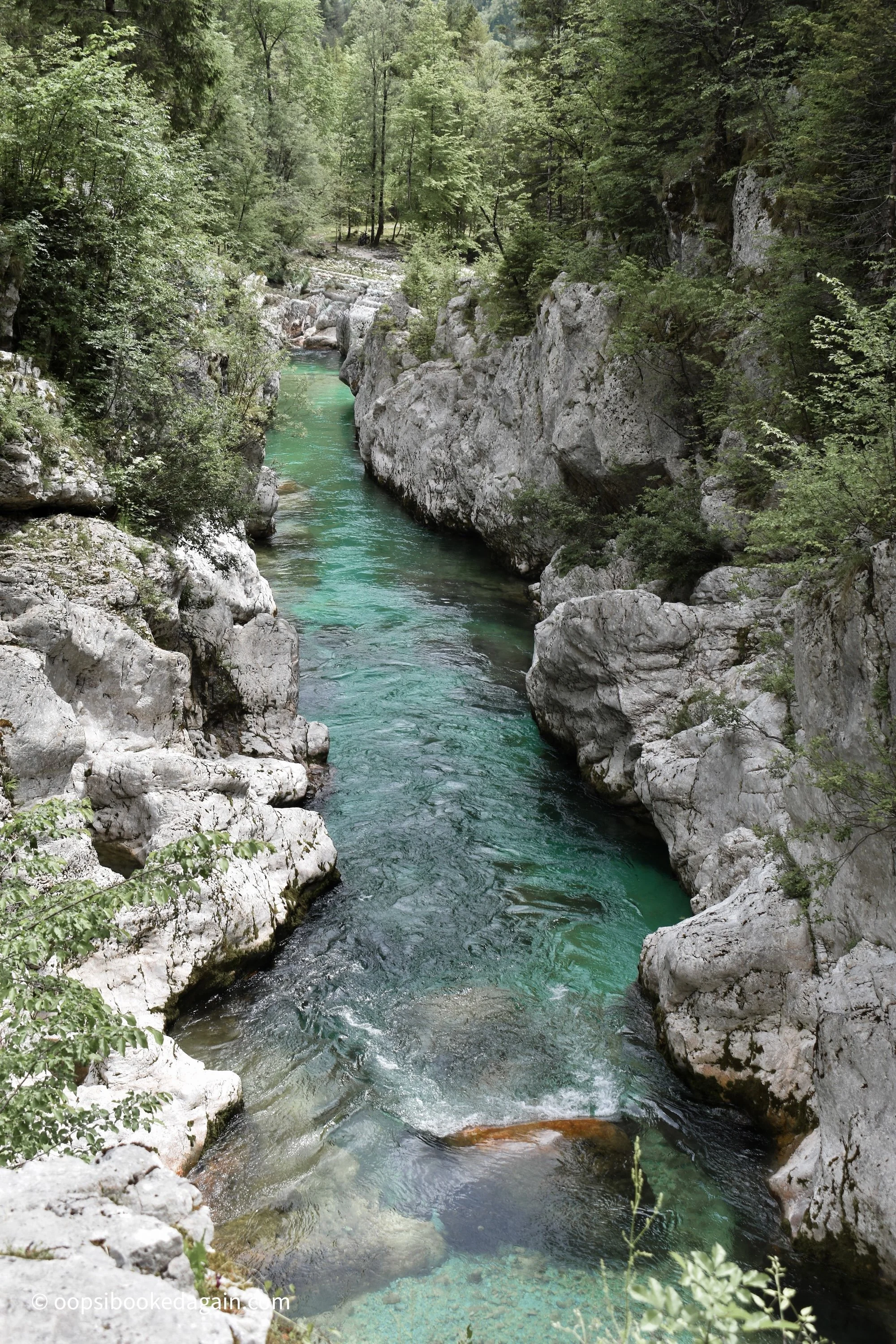 Emerald waters of the Great Soča Gorge during the Soča trail