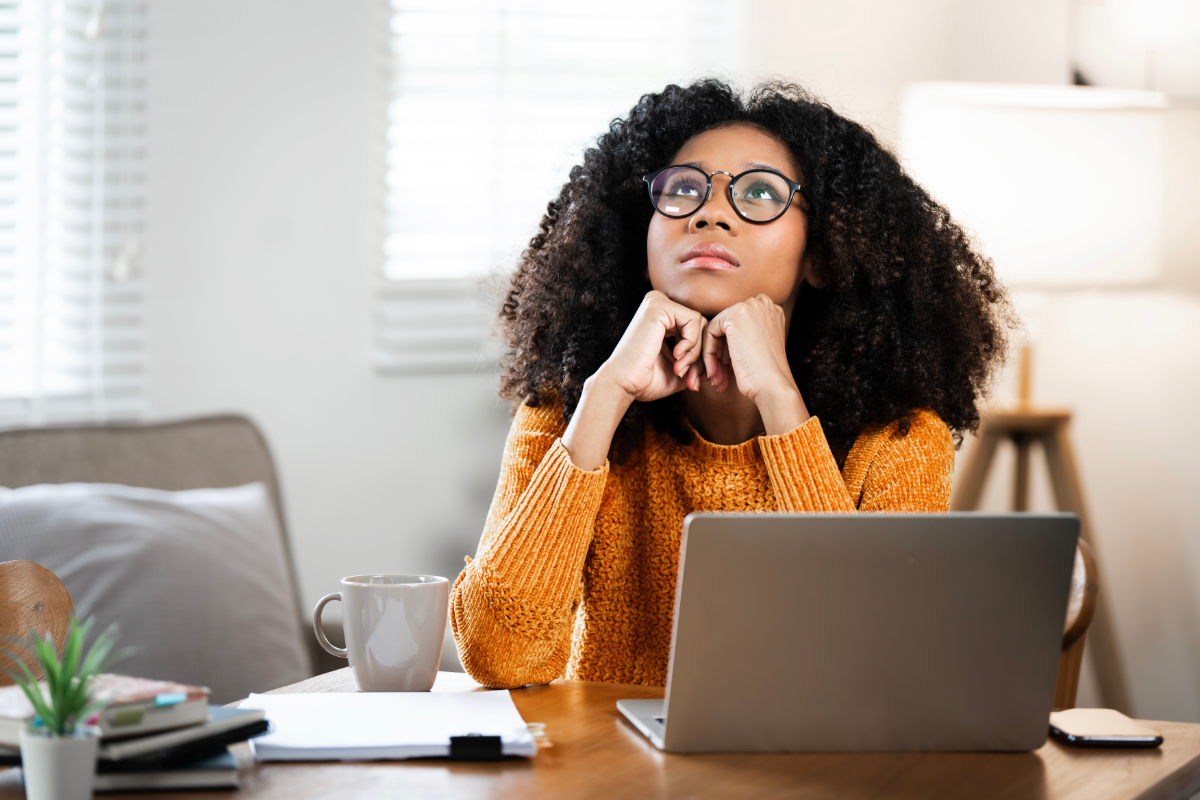 Woman in moment of self-reflection and healing from family patterns