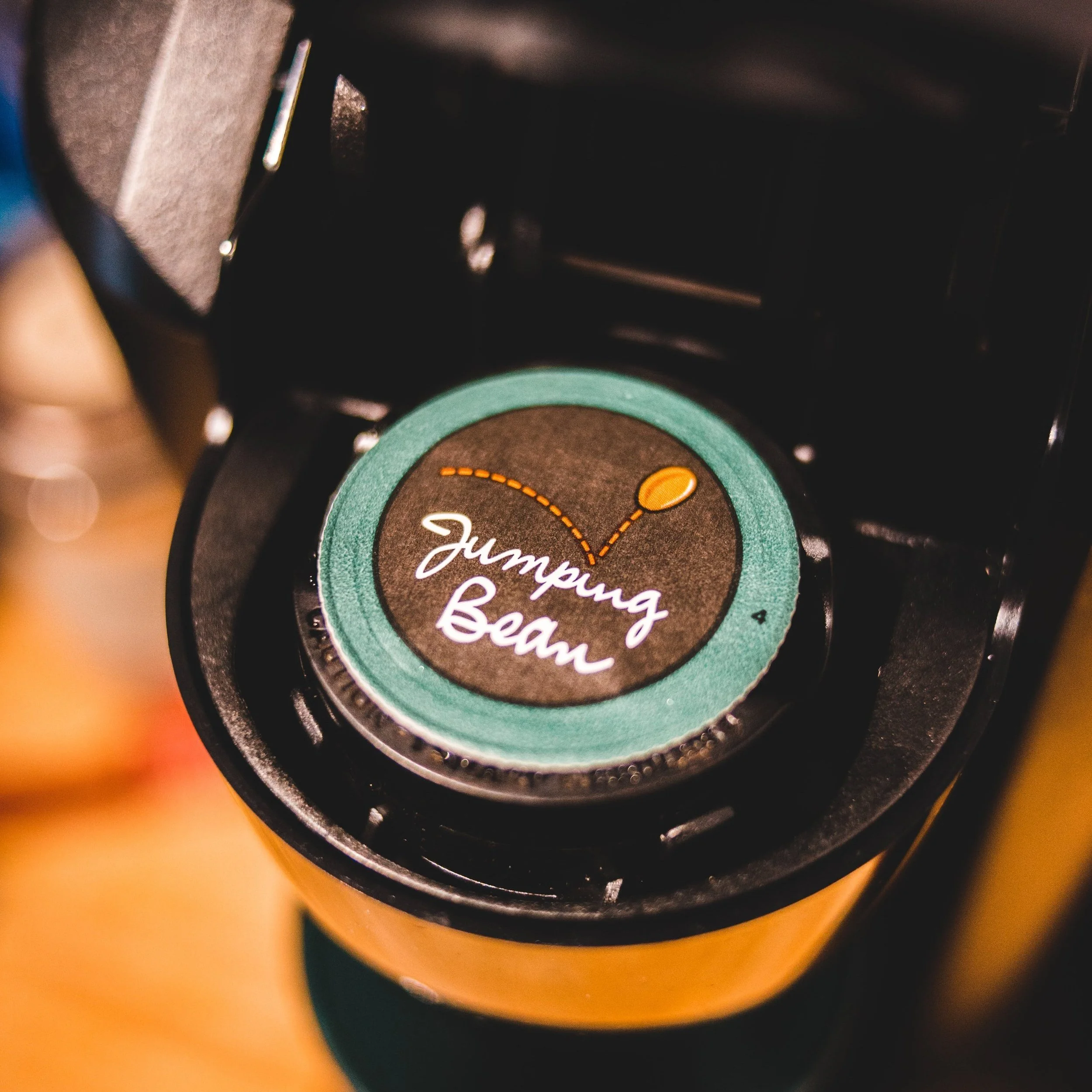 A K Cup Pod in a black coffee machine.