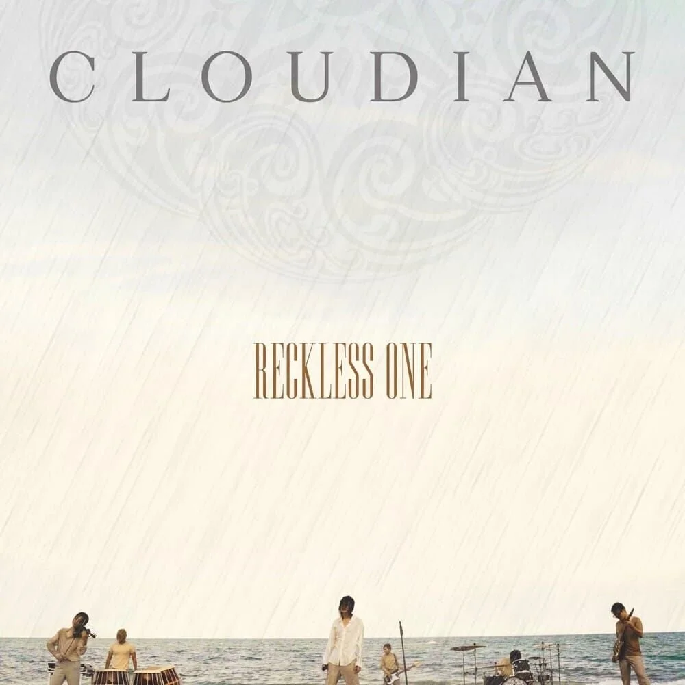 Album cover for Cloudian's 'Reckless One', featuring a band playing on the beach.