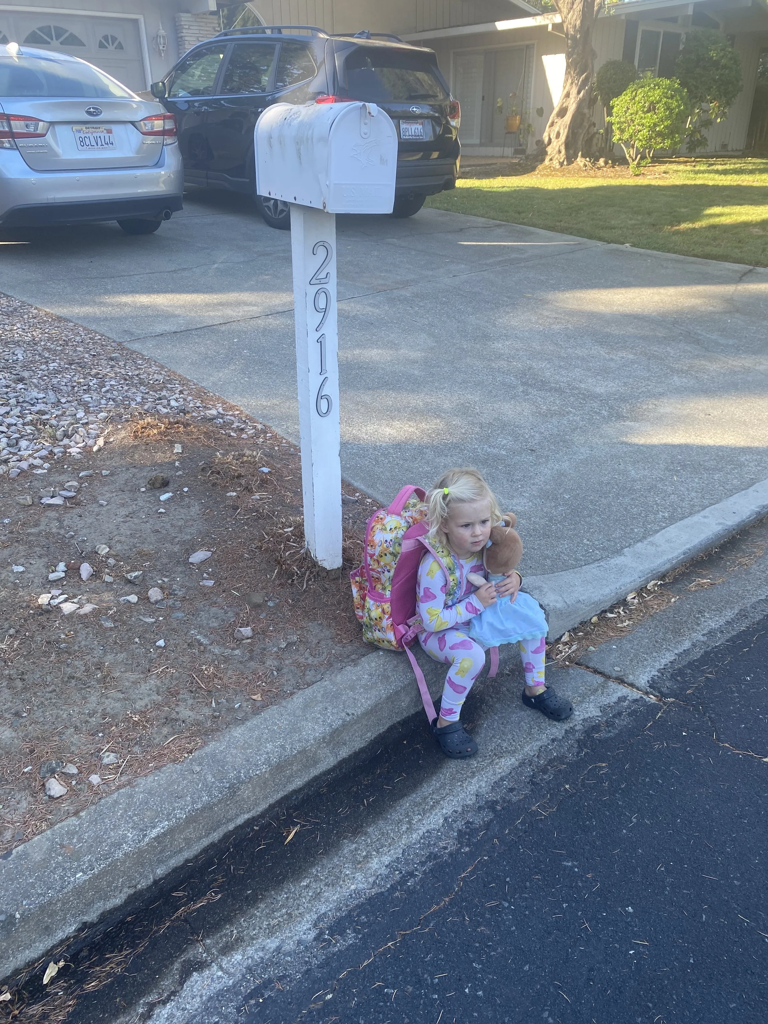 Outside her new house