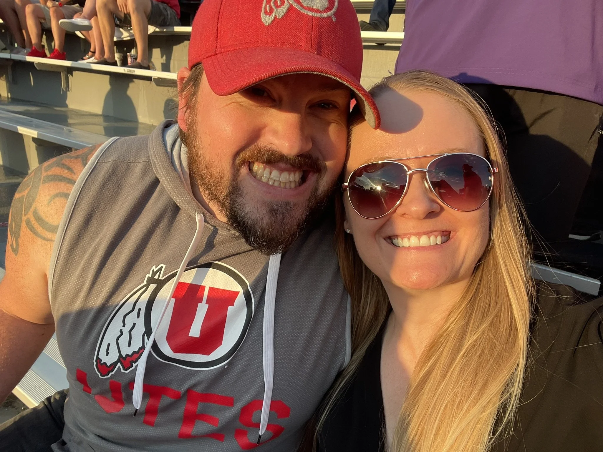 Jennifer Hamelin at a football game with her husband