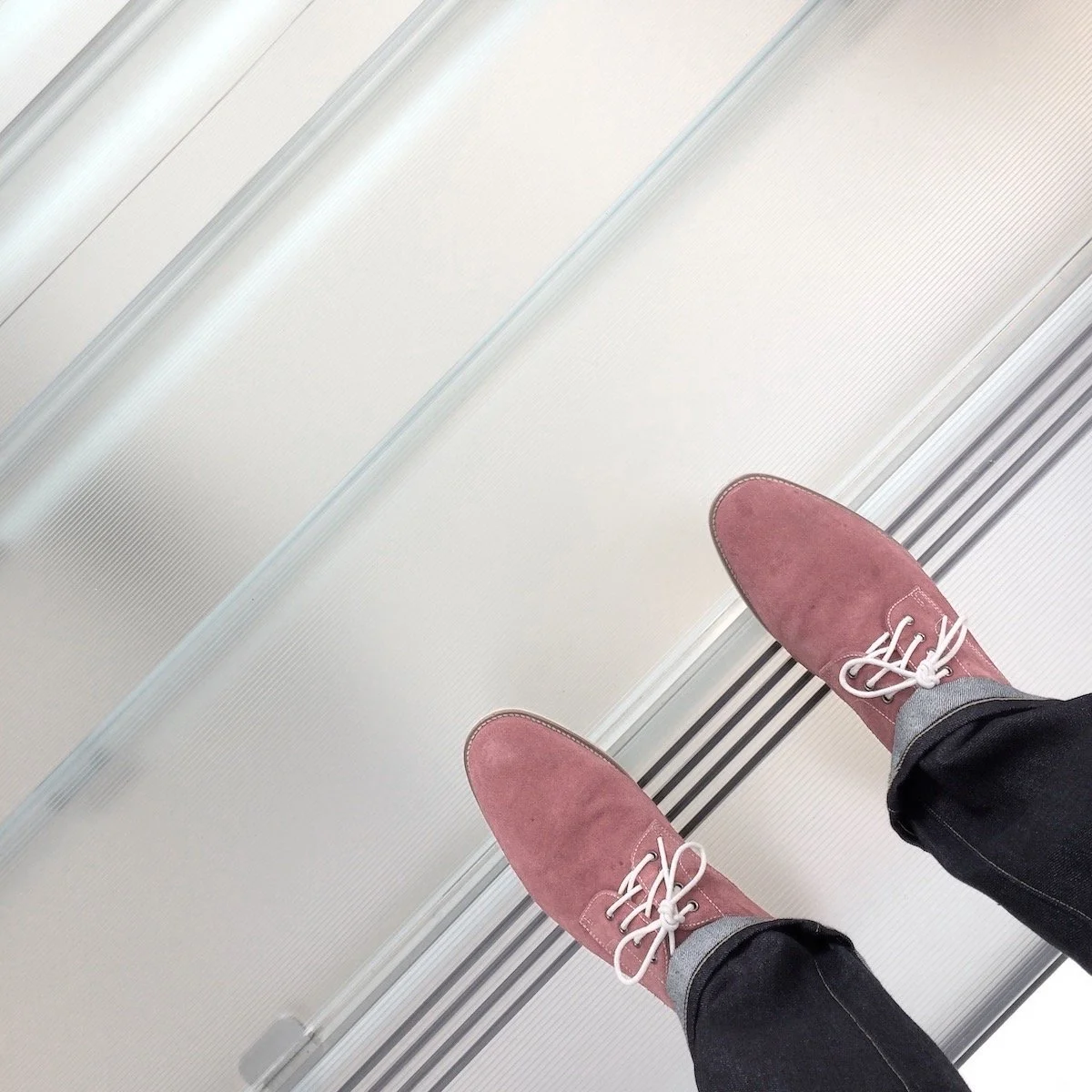 Image of Nate Davis wearing red shoes, for module 3, "creative personality," in the Narrative Podcasts Labs training program