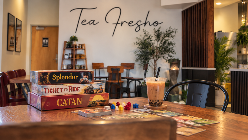 Board games set up for a cozy Game Night gathering at Tea Fresho
