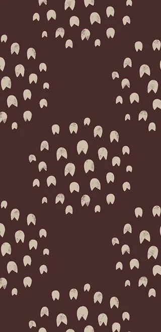 Seamless warm brown pattern with cream abstract shapes forming a repeating circle motif
