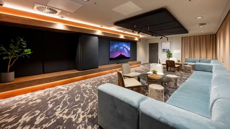 student-accommodation-leeds-the-fabric-works-cinema-room-sofas.jpg