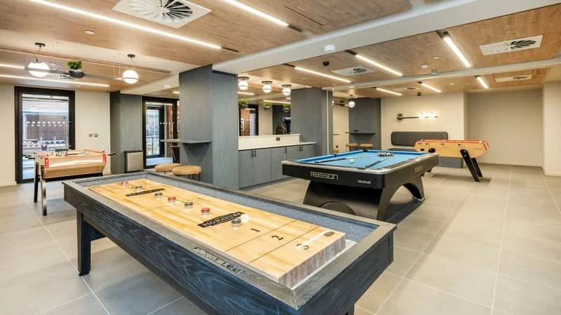 student-accommodation-leeds-the-fabric-works-games-room-shuffleboard.jpg