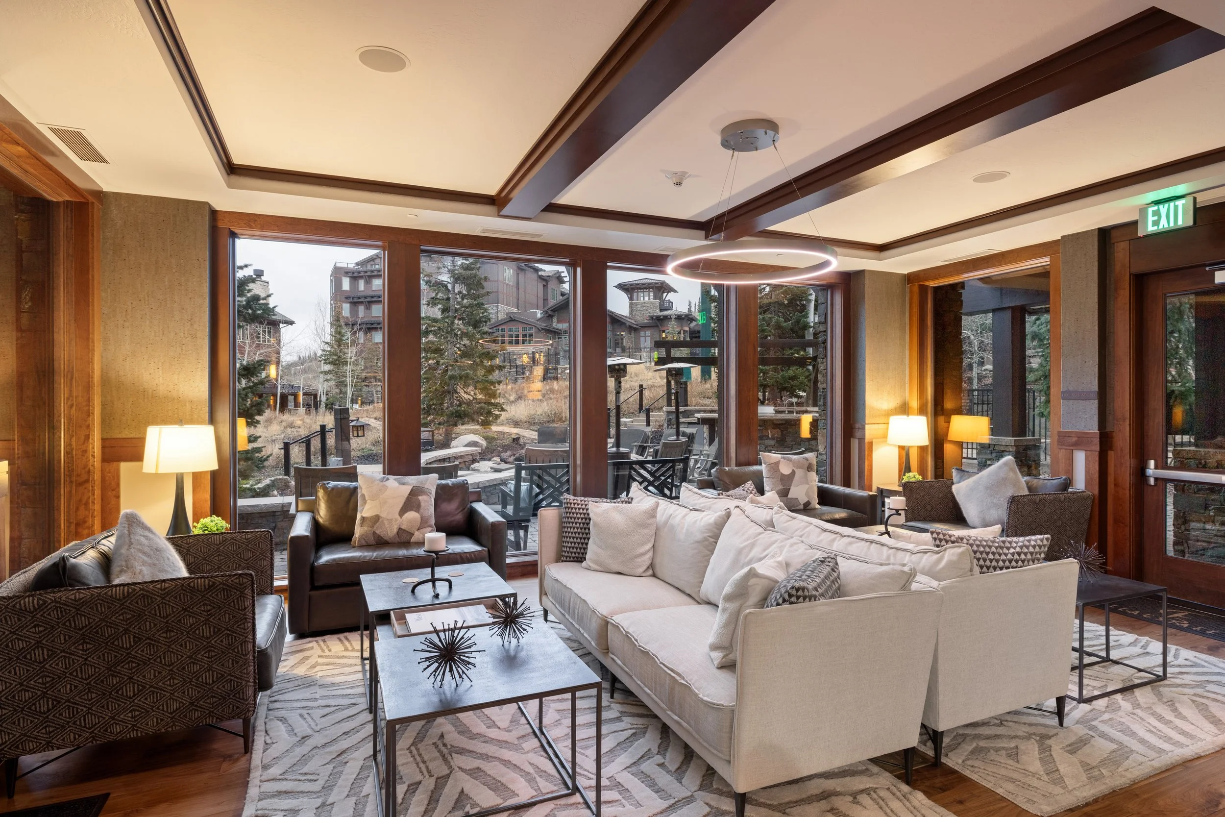 Owners' lounge with slope-side windows overlooking the village