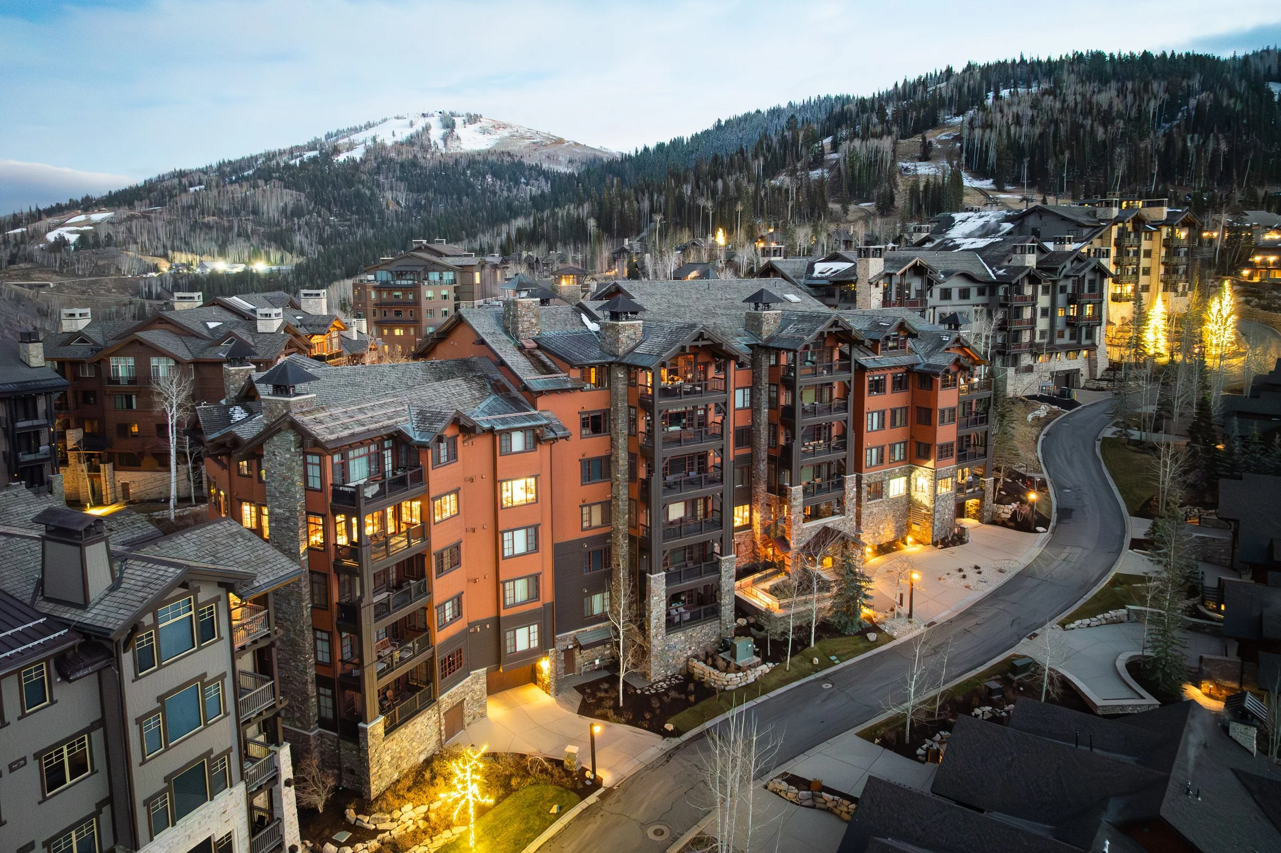 Aerial view of Flagstaff Lodge in the heart of Empire Pass at twilight