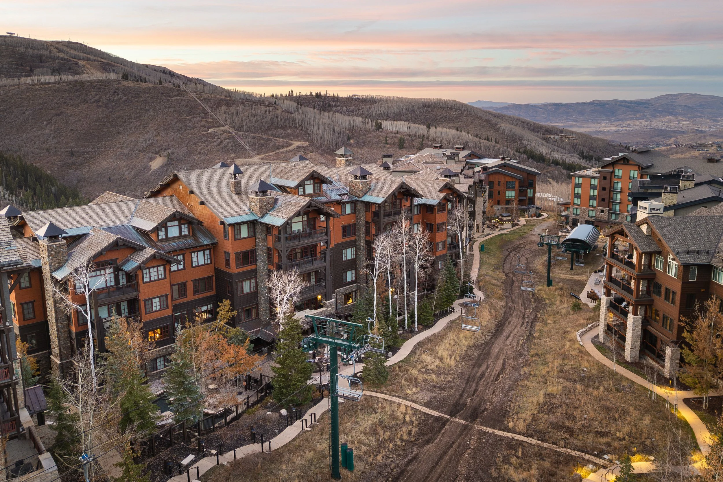 Flagstaff Lodge with Silver Buck trail and ski lift at golden hour