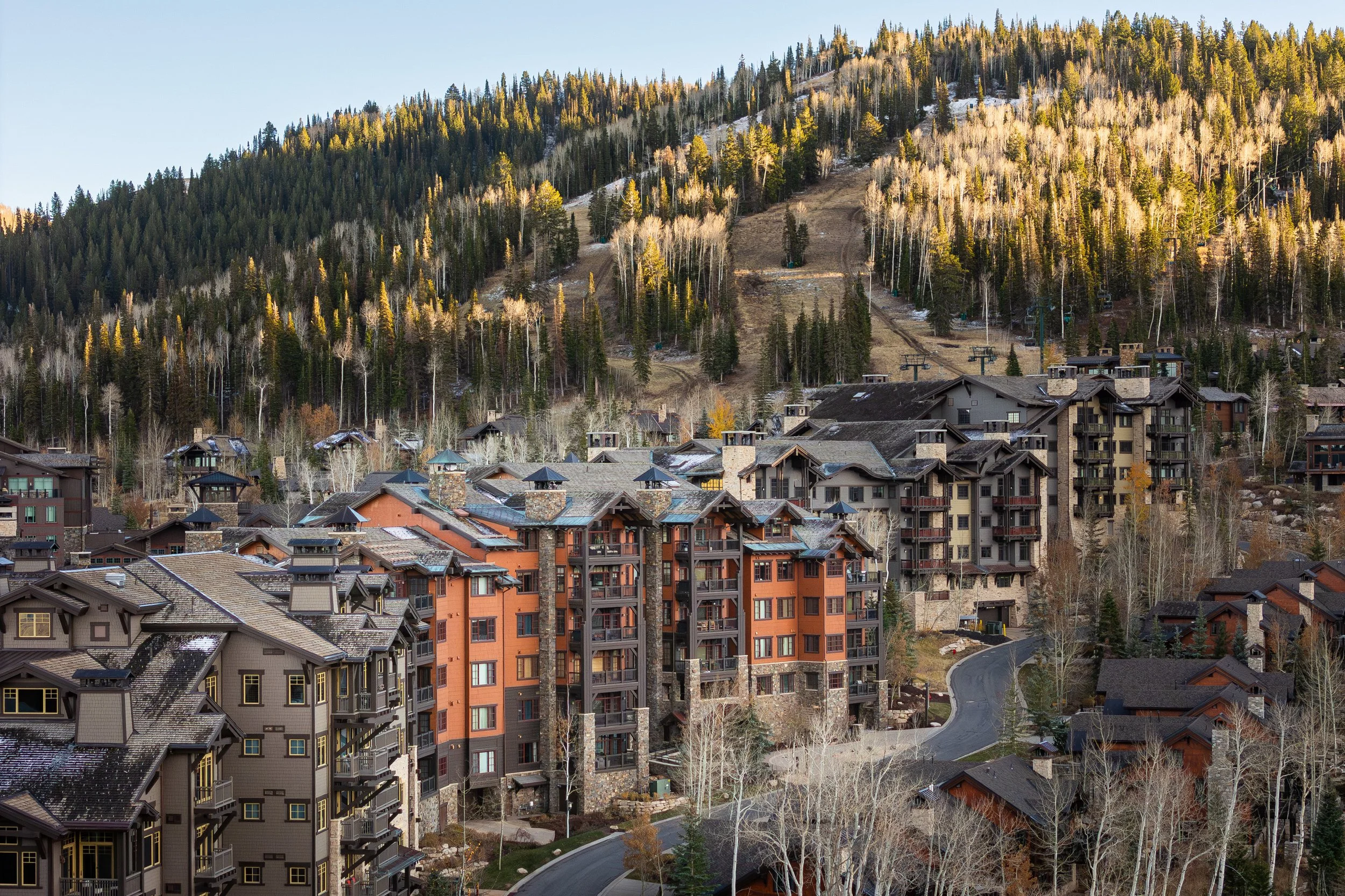 Flagstaff Lodge and Empire Pass village with Silver Strike Express at sunset