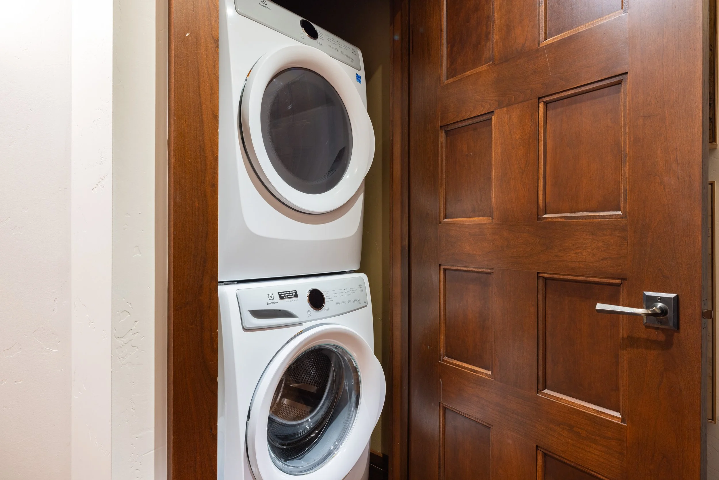 In-unit Electrolux washer and dryer — detergent and dryer sheets provided